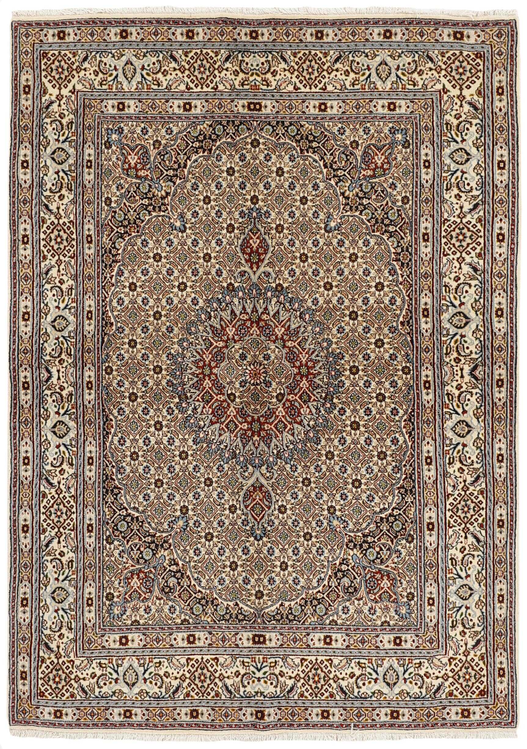 authentic persian rug with traditional floral pattern in cream, blue and red