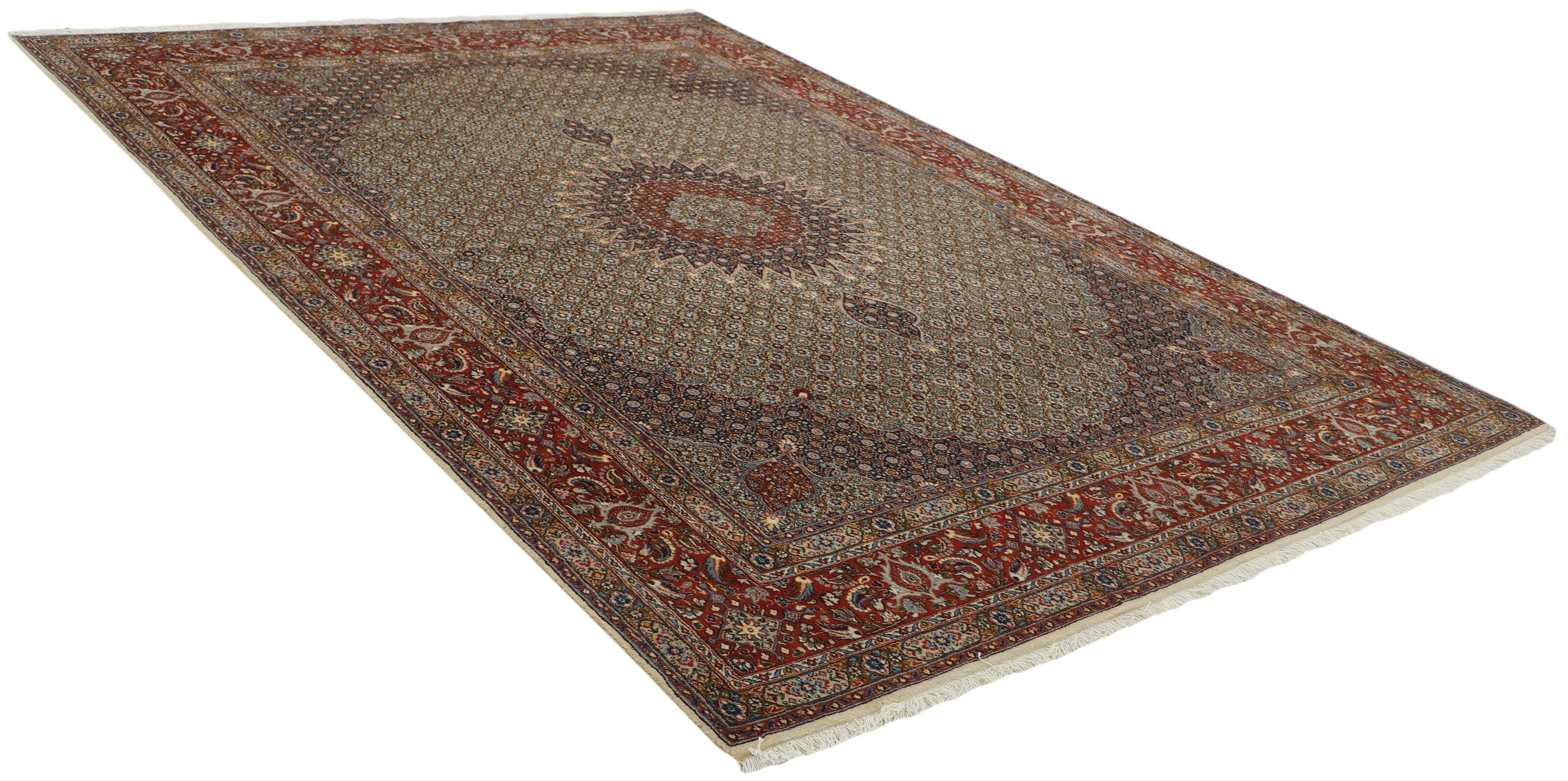  authentic persian rug with traditional floral pattern in red, pink, yellow, blue, green, cream, beige, brown and black