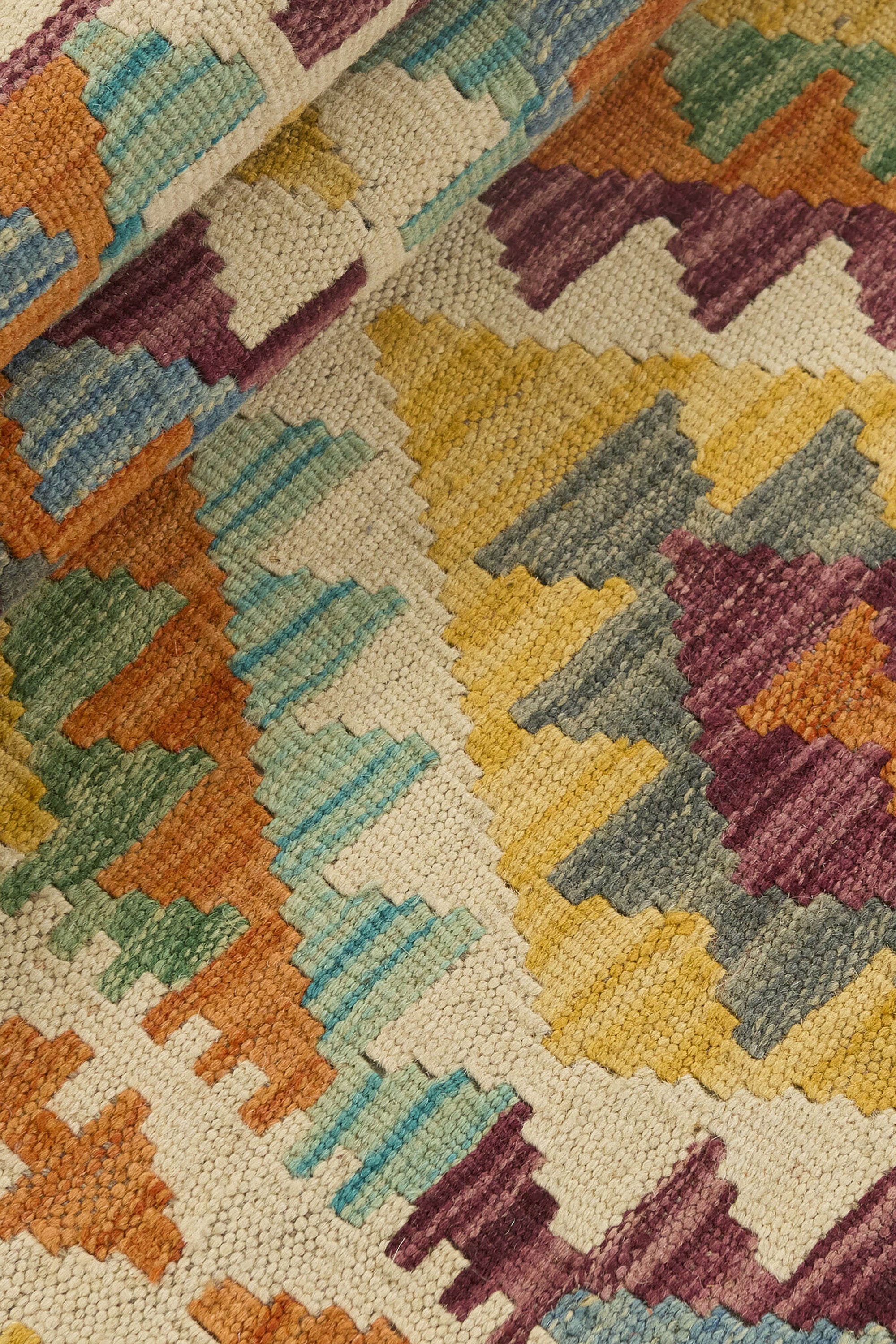 Authentic Afghan Kelim flatweave rug with traditional multicolour pattern.

