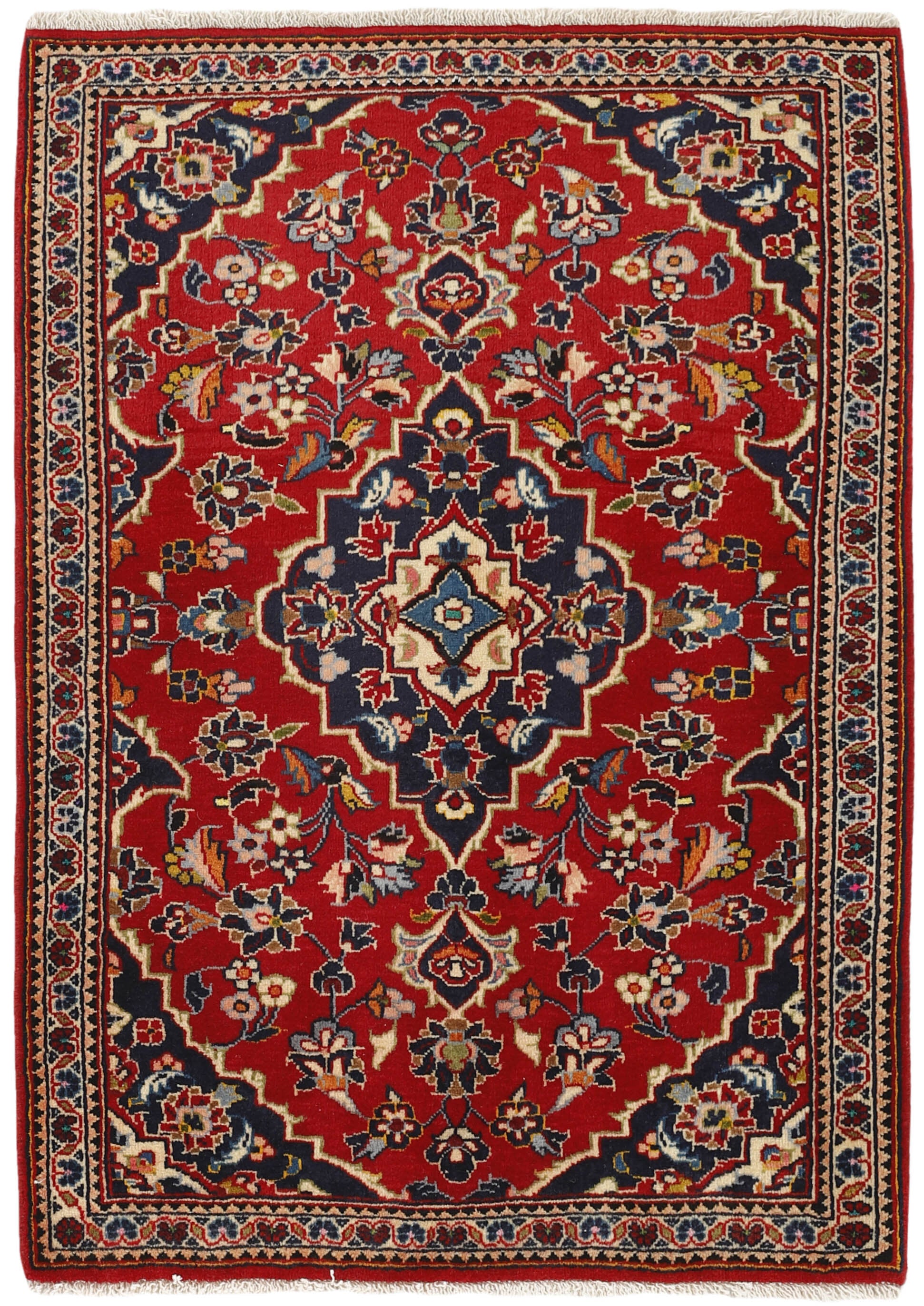 Traditional bordered Keshan rug with red background