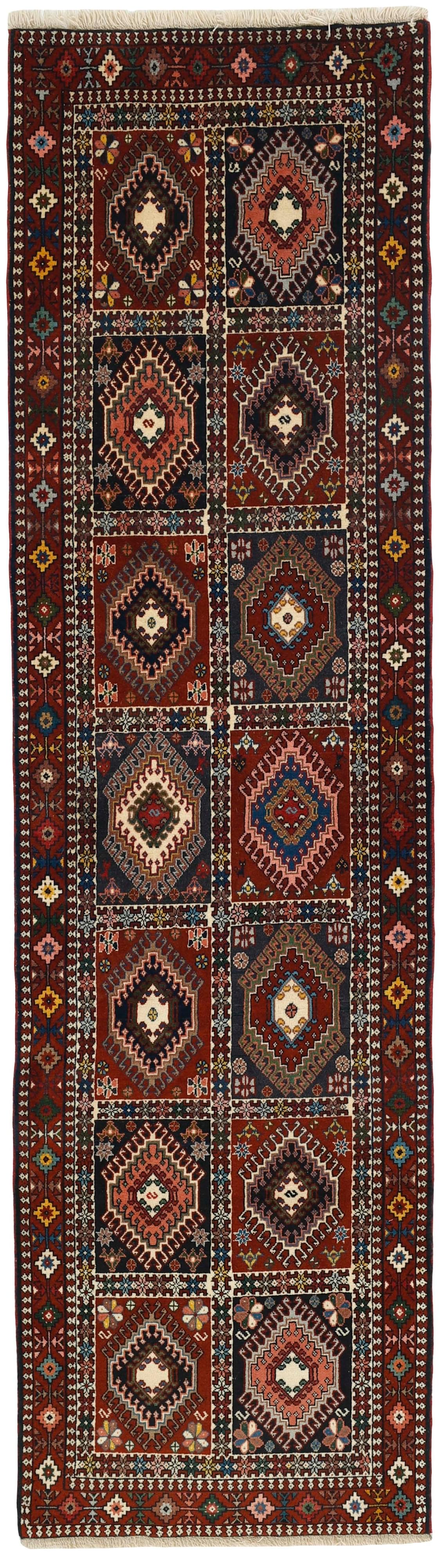 red authentic persian runner with a traditional design
