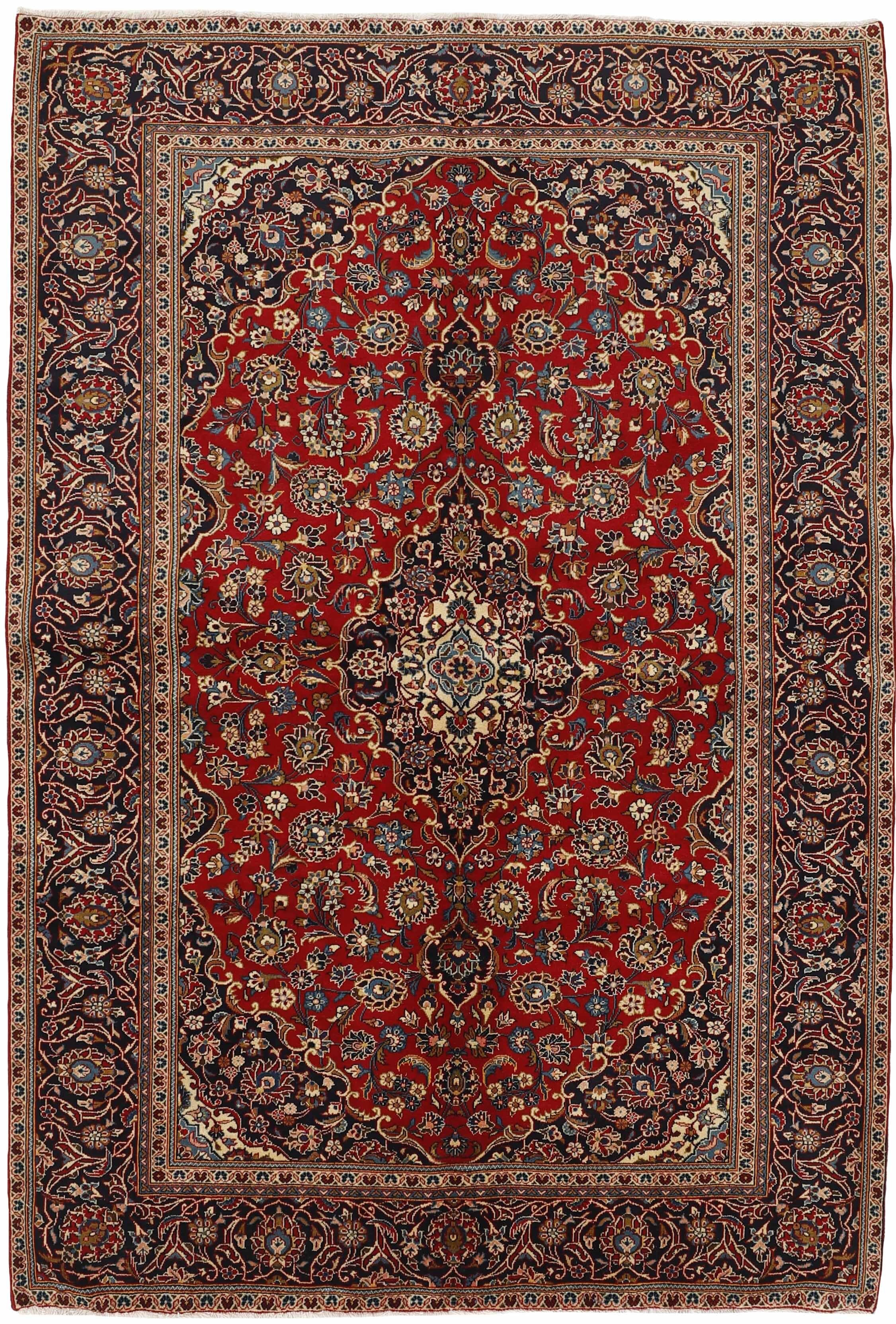 Traditional bordered Keshan rug with red background