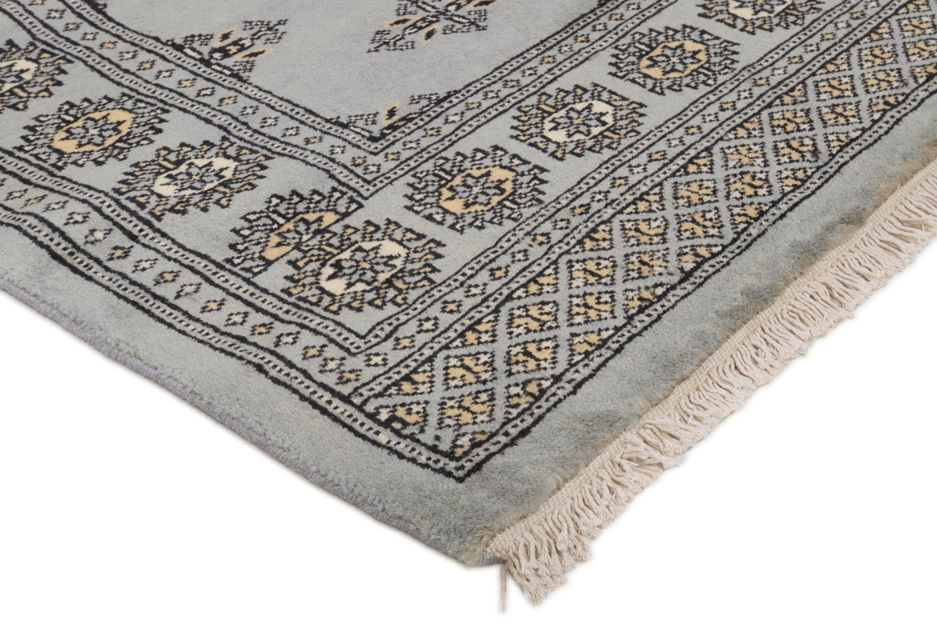 Grey Oriental runner with traditional bordered pattern