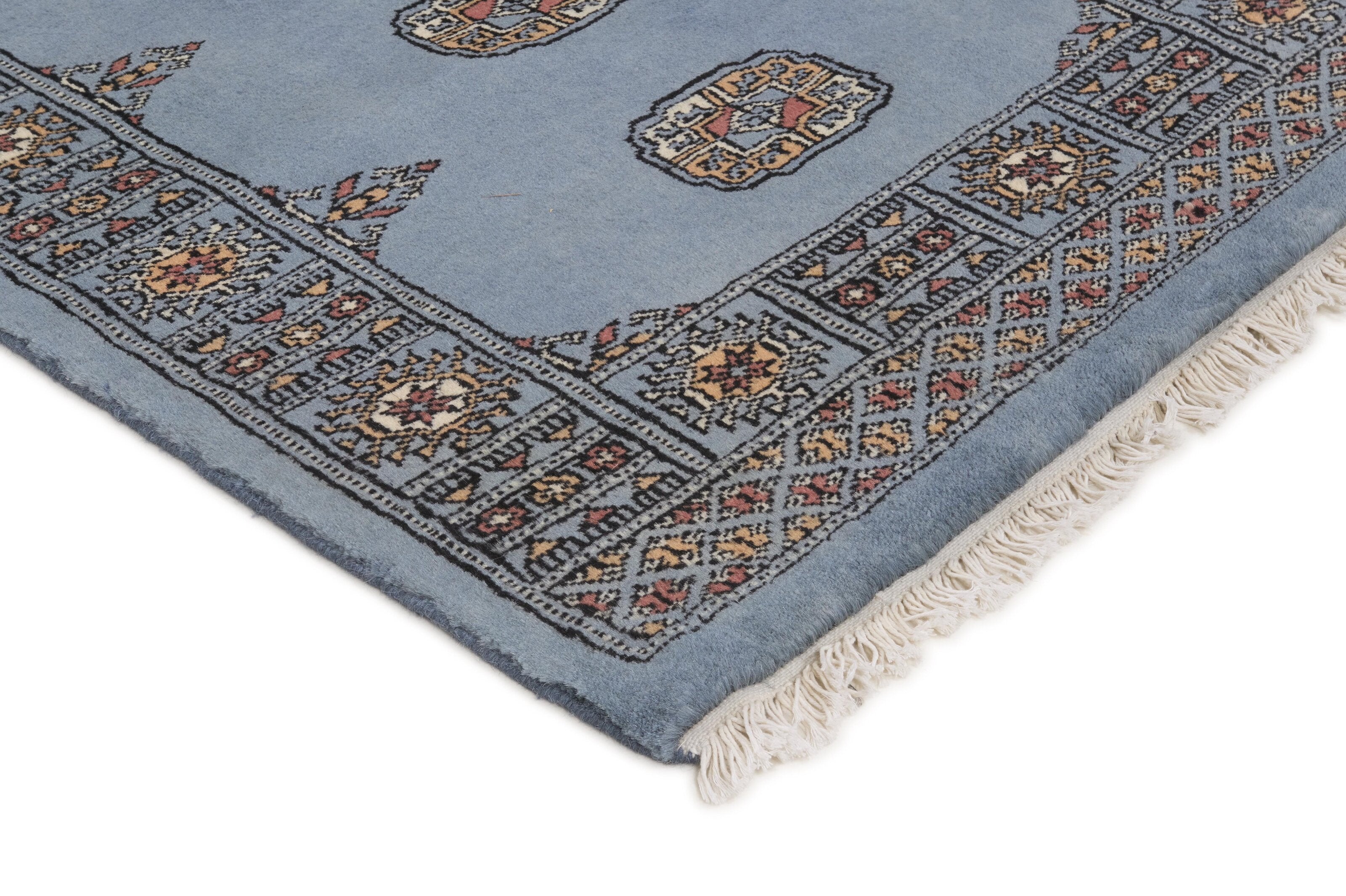 Blue Oriental runner with traditional bordered pattern