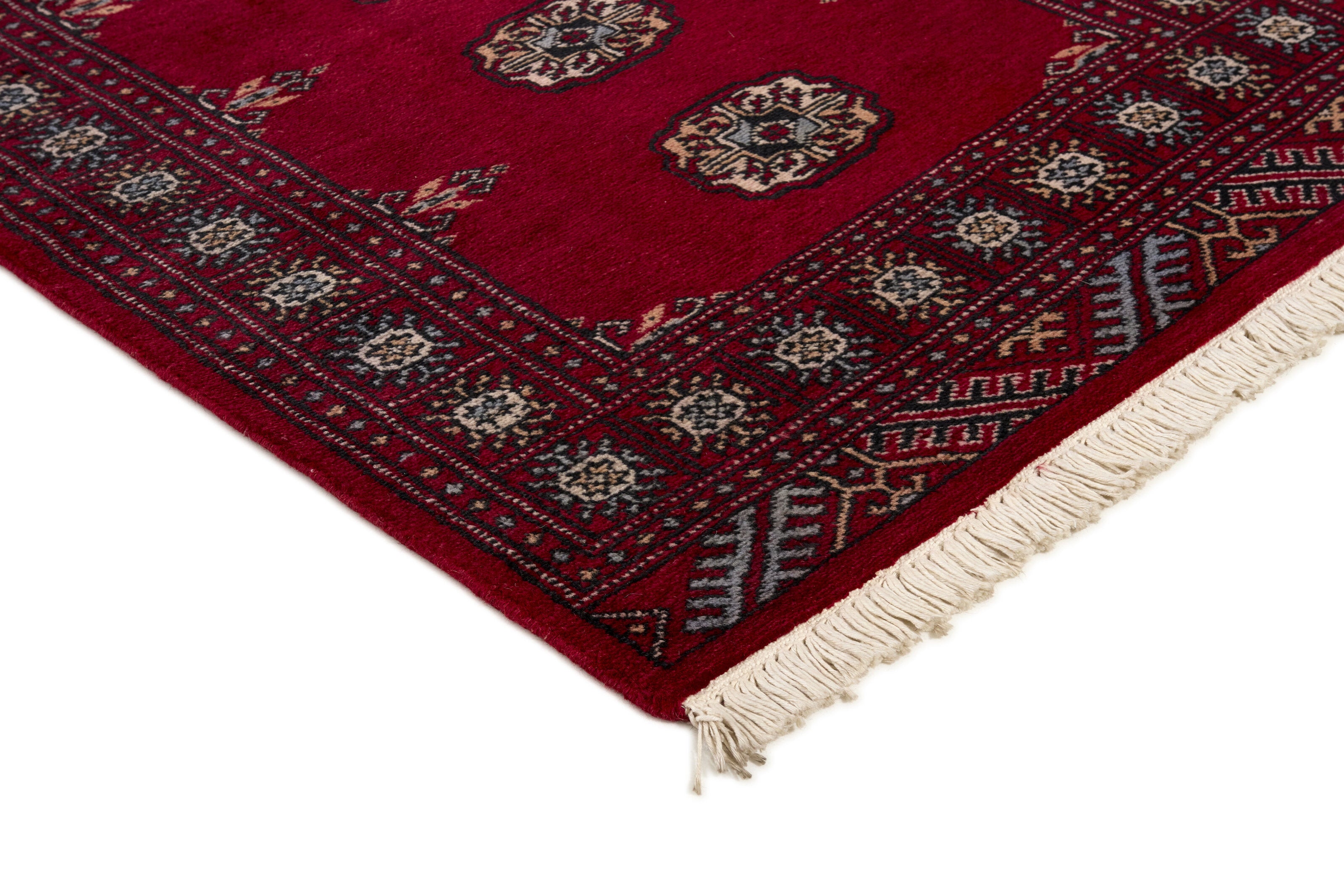 Red Oriental runner with traditional bordered pattern