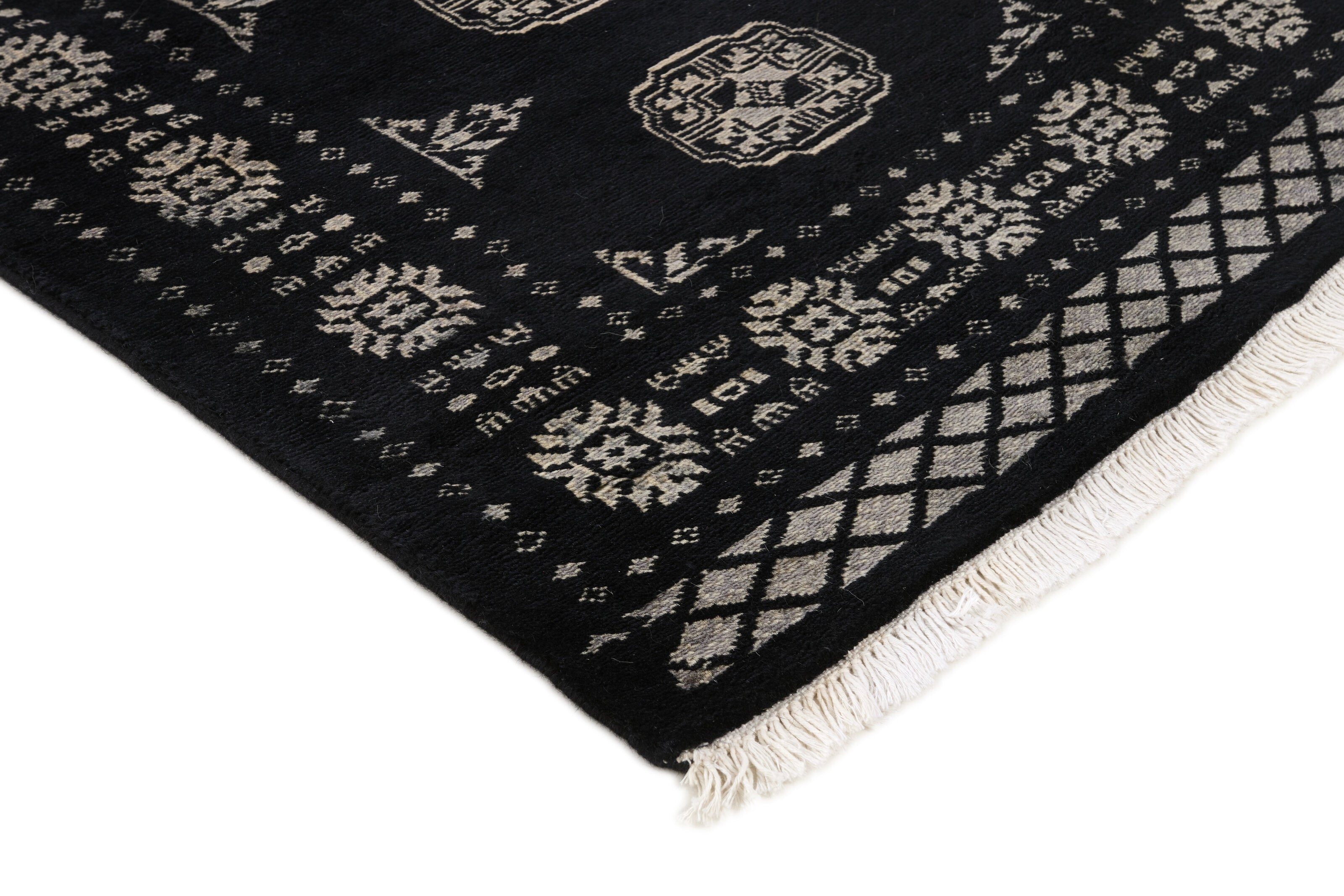 Black Oriental runner with traditional bordered pattern