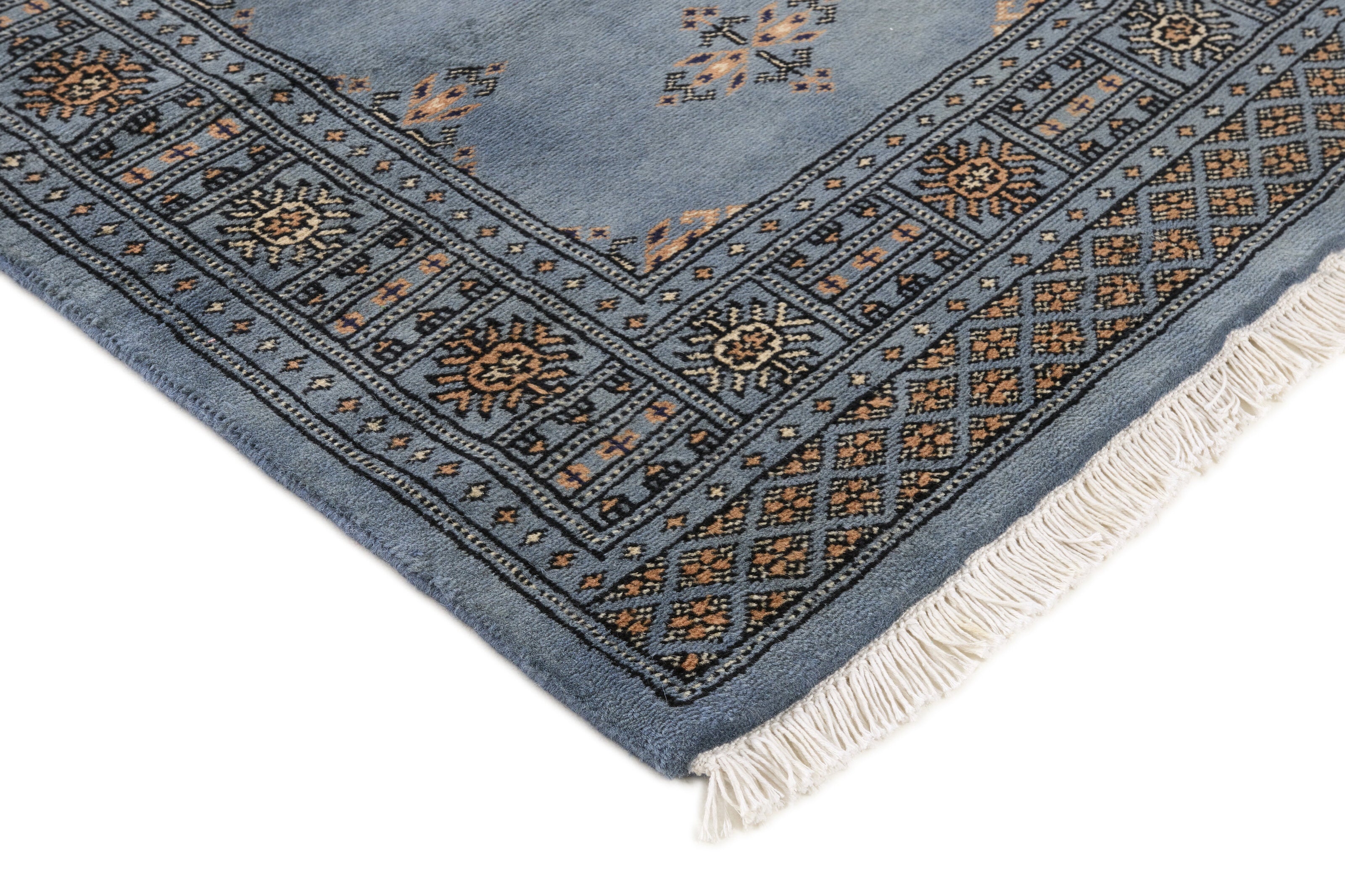 Blue Oriental runner with traditional bordered pattern