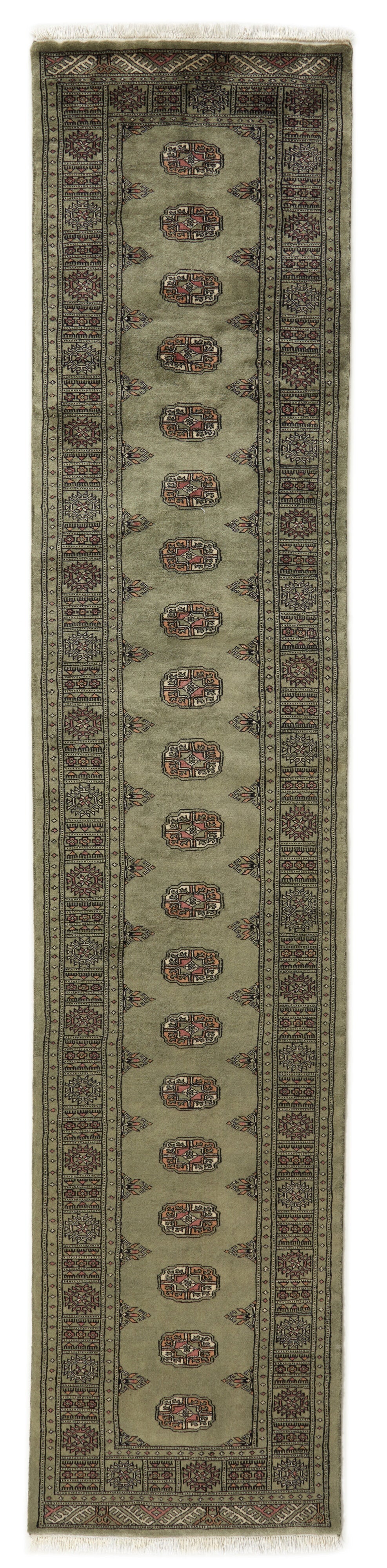 Green Oriental runner with traditional bordered pattern