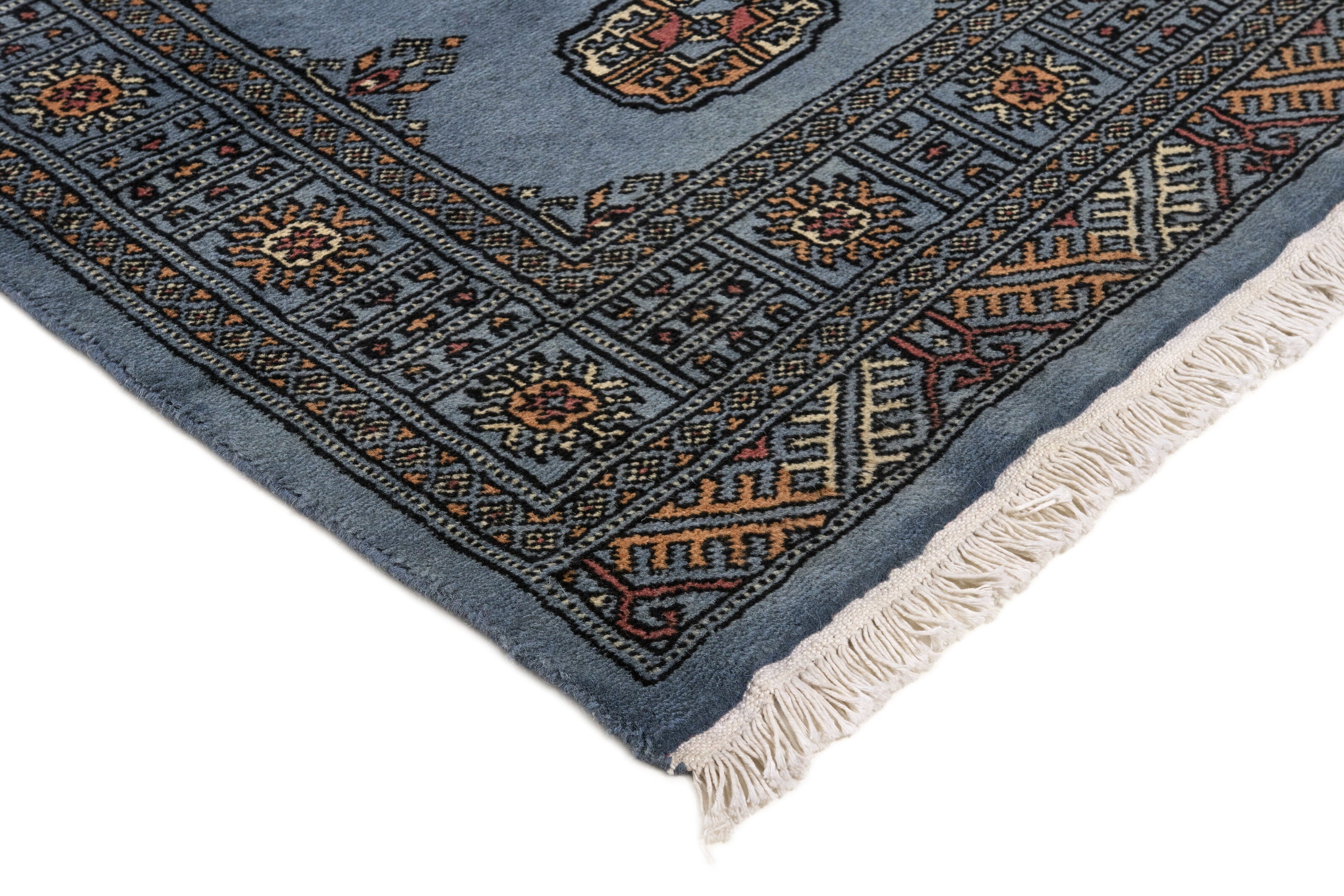 Blue Oriental runner with traditional bordered pattern