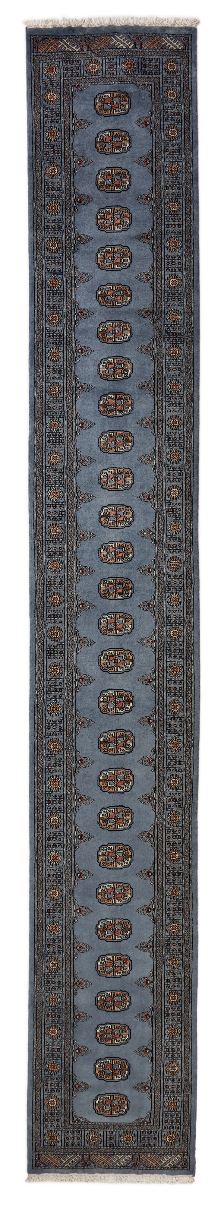 Blue Oriental runner with traditional bordered pattern