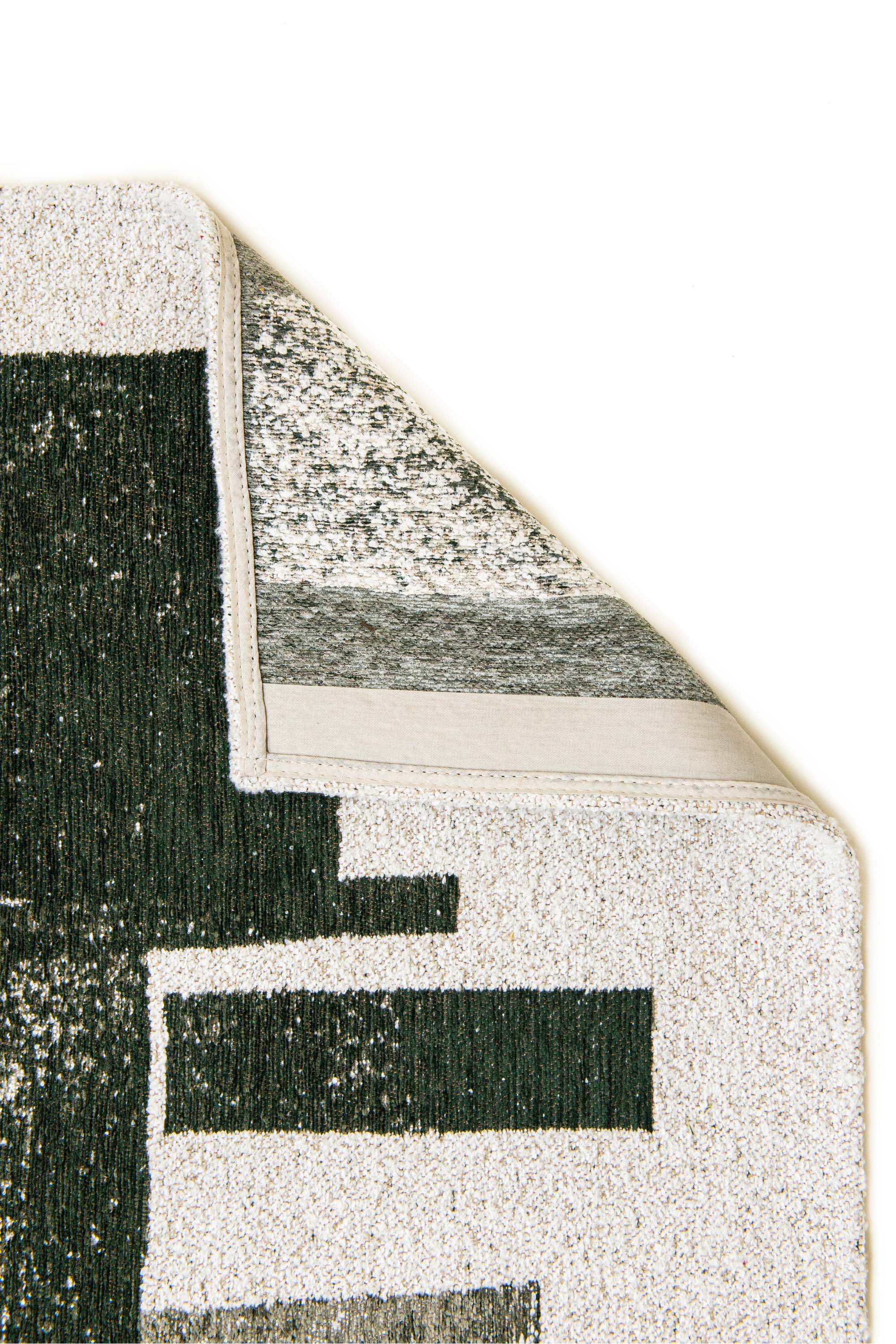 Modern abstract rug with green stacked pattern