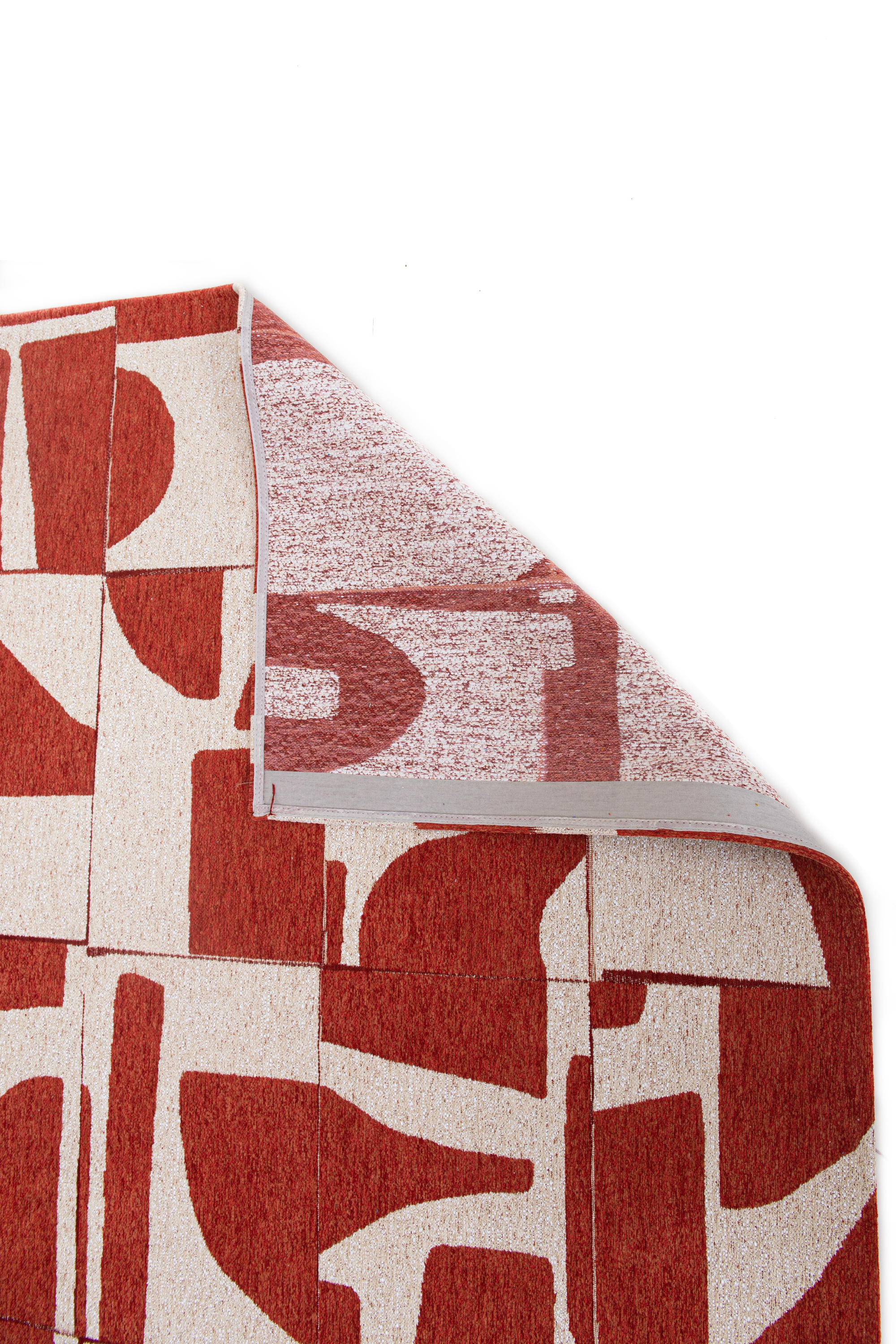 Modern abstract rug with red patchwork pattern