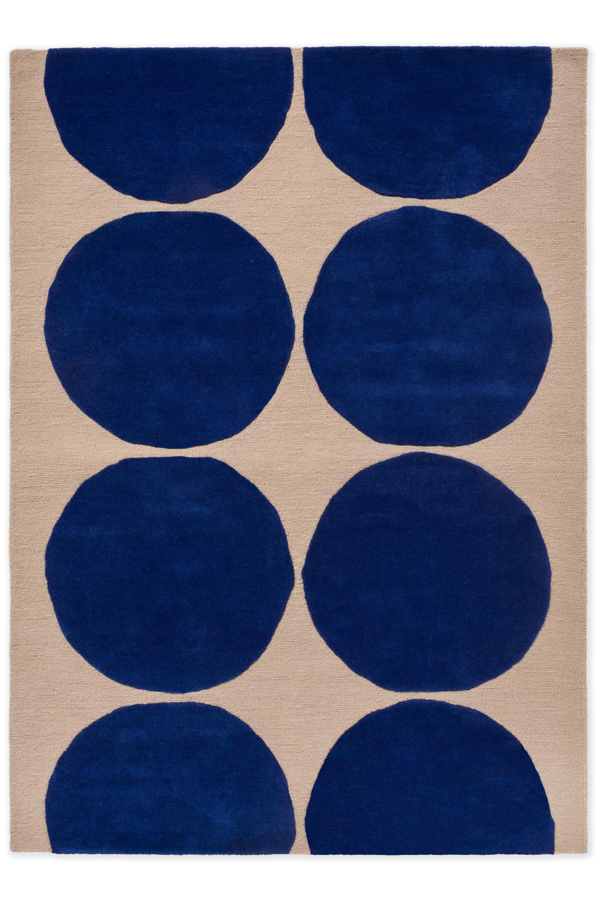 Beige rug with blue repeated circle pattern