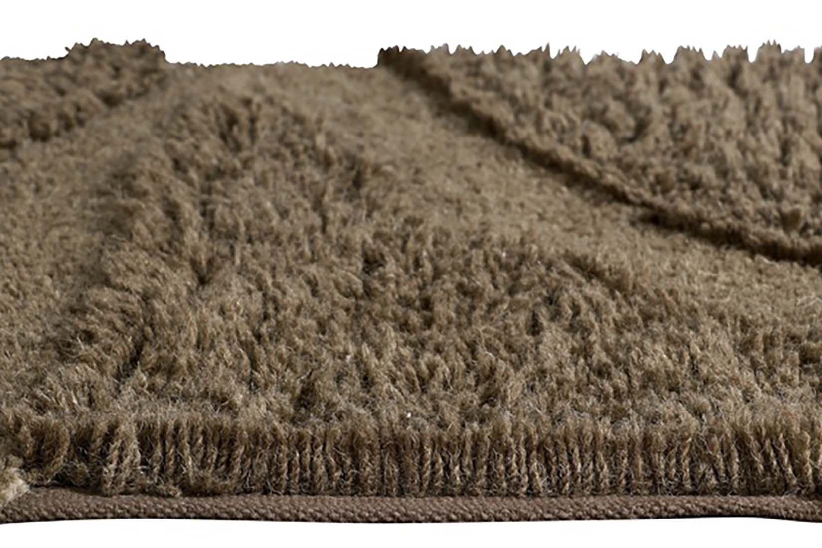 textured brown area rug
