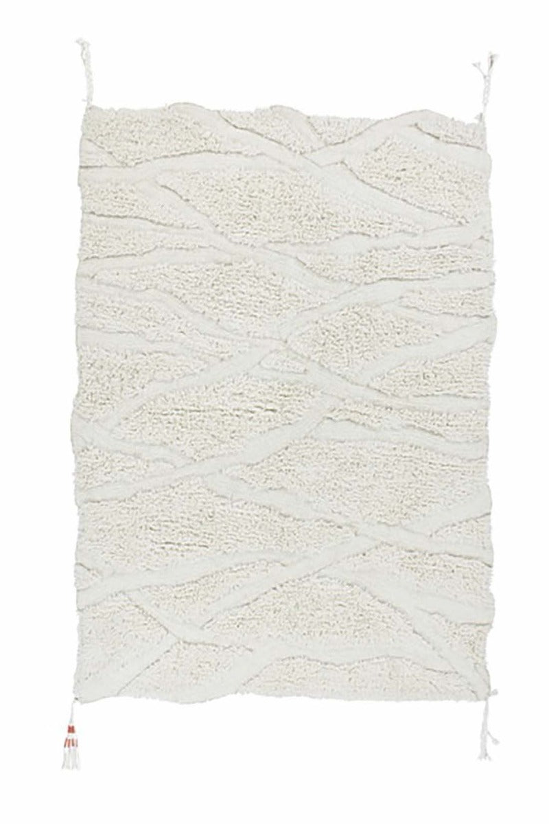 textured cream area rug with tribal design
