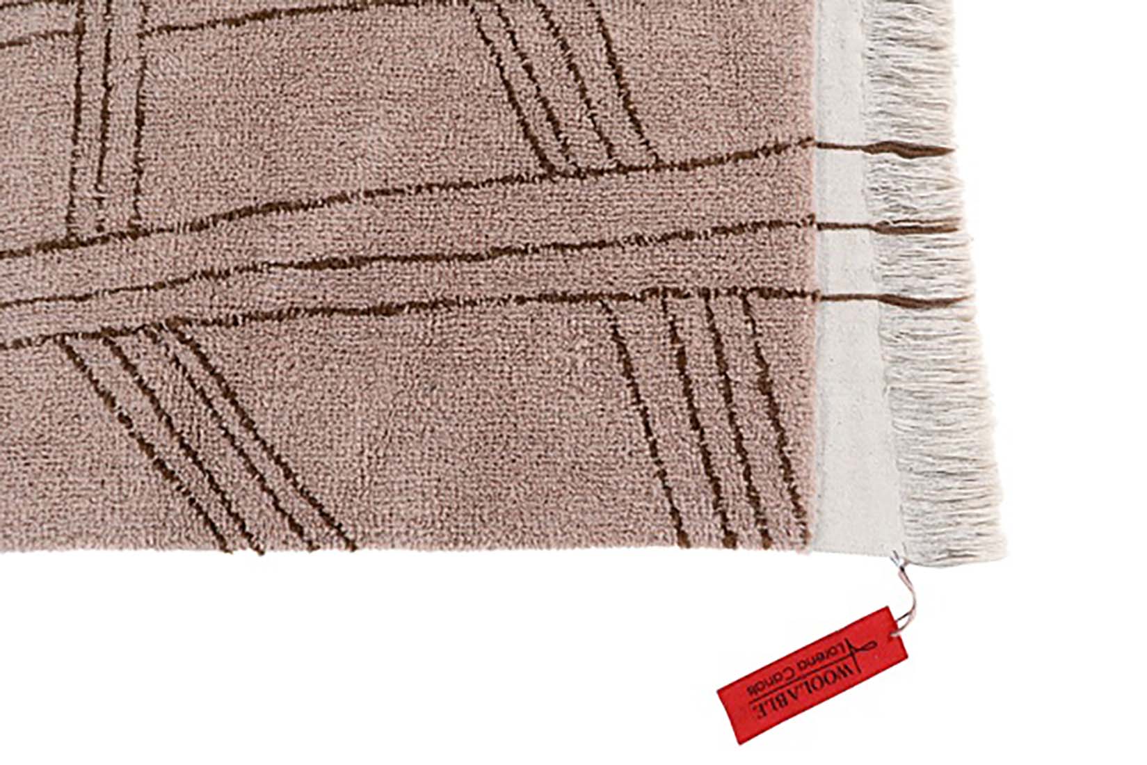 dusty pink area rug with tribal design
