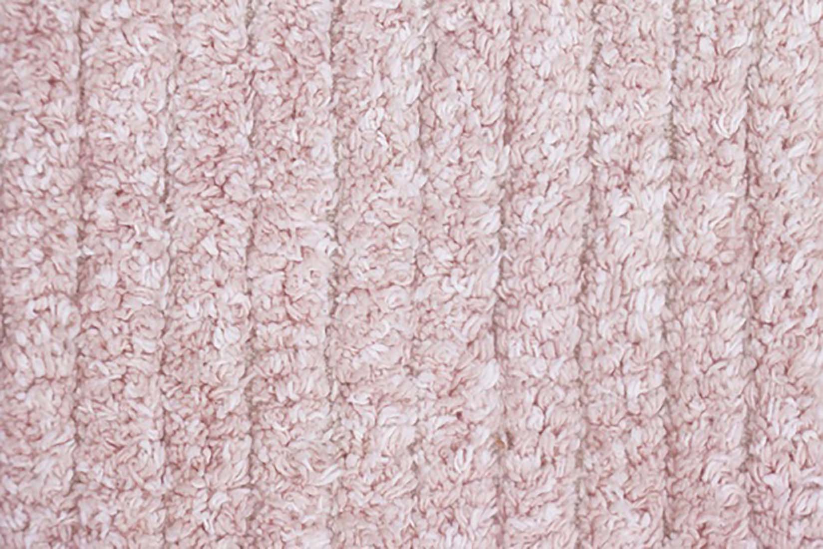 reversible textured rug in pink and ivory with ombre design
