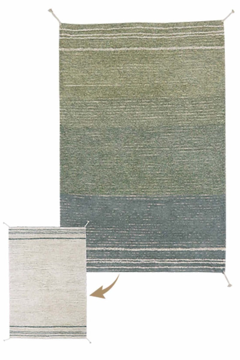 reversible textured rug in beige and blue with soft gradient design
