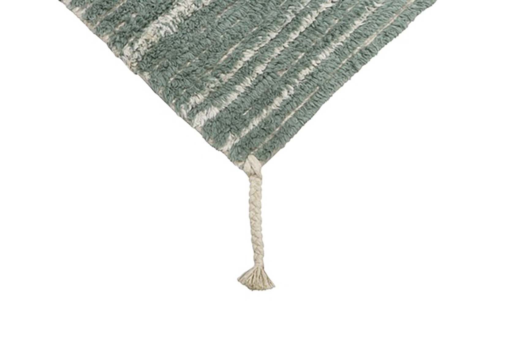 reversible textured rug in beige and blue with soft gradient design
