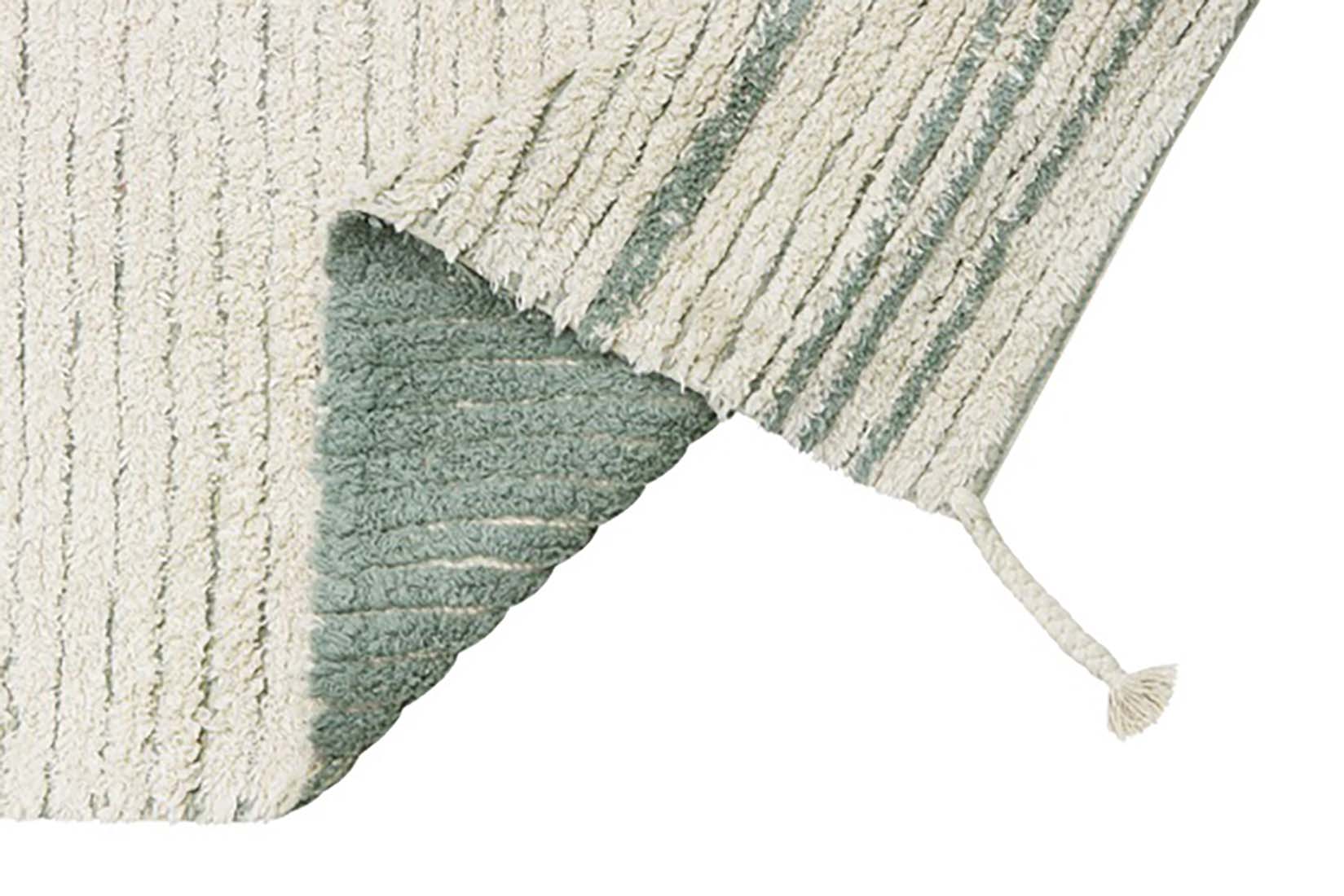 reversible textured rug in beige and blue with soft gradient design
