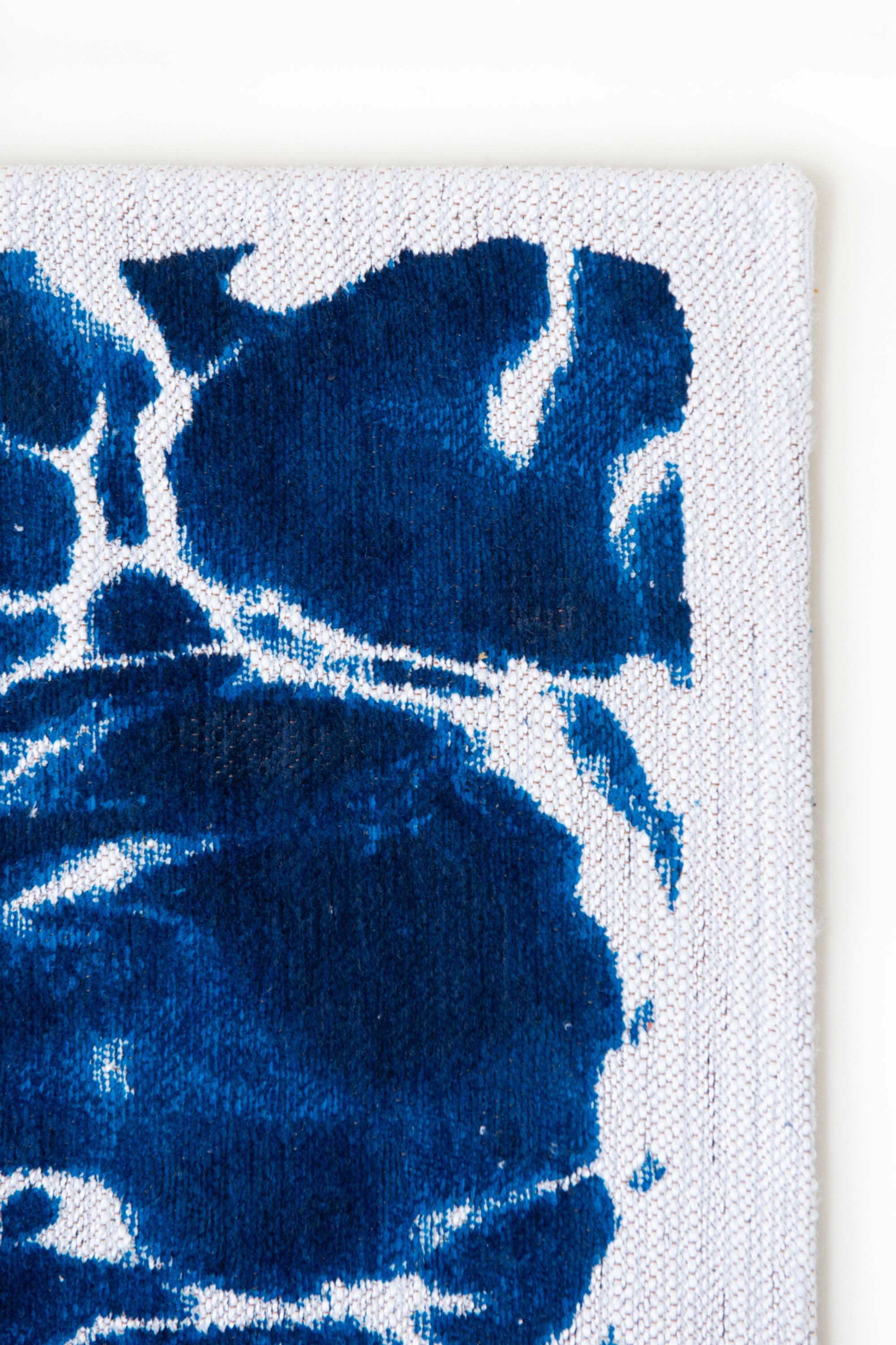 Modern runner rug with blue abstract water inspired pattern