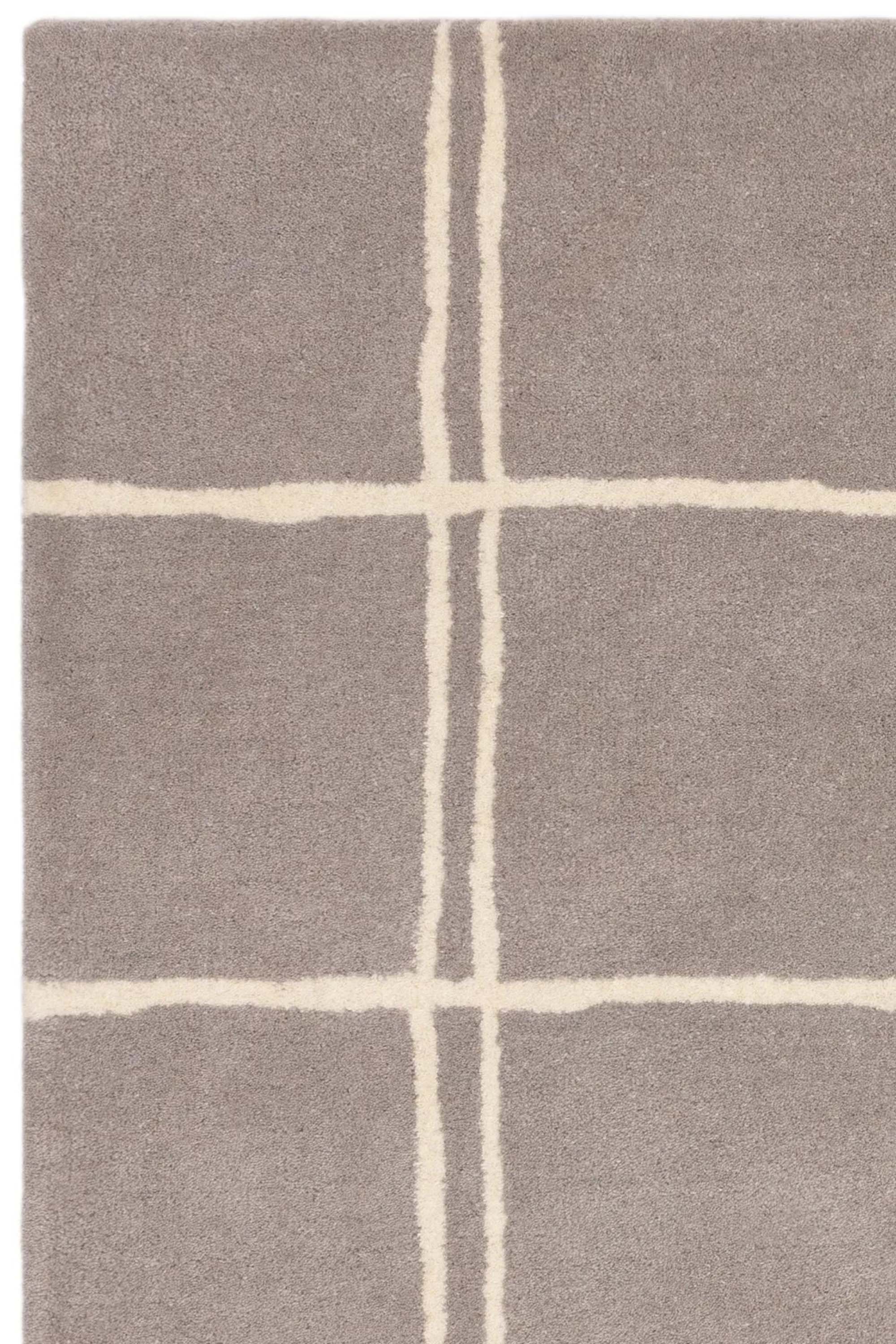 Grey rug with minimal geometric pattern 