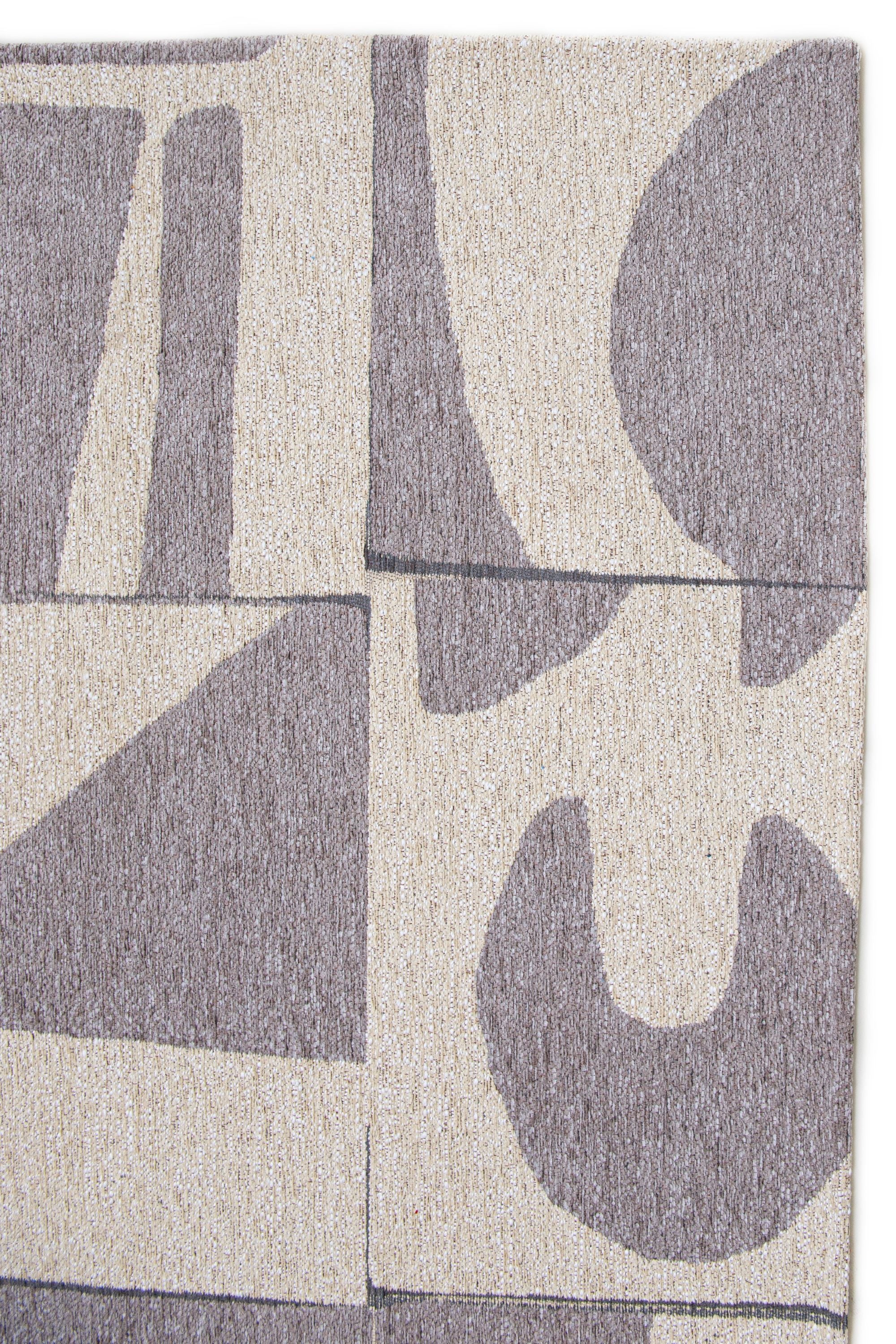 Modern abstract rug with grey patchwork pattern