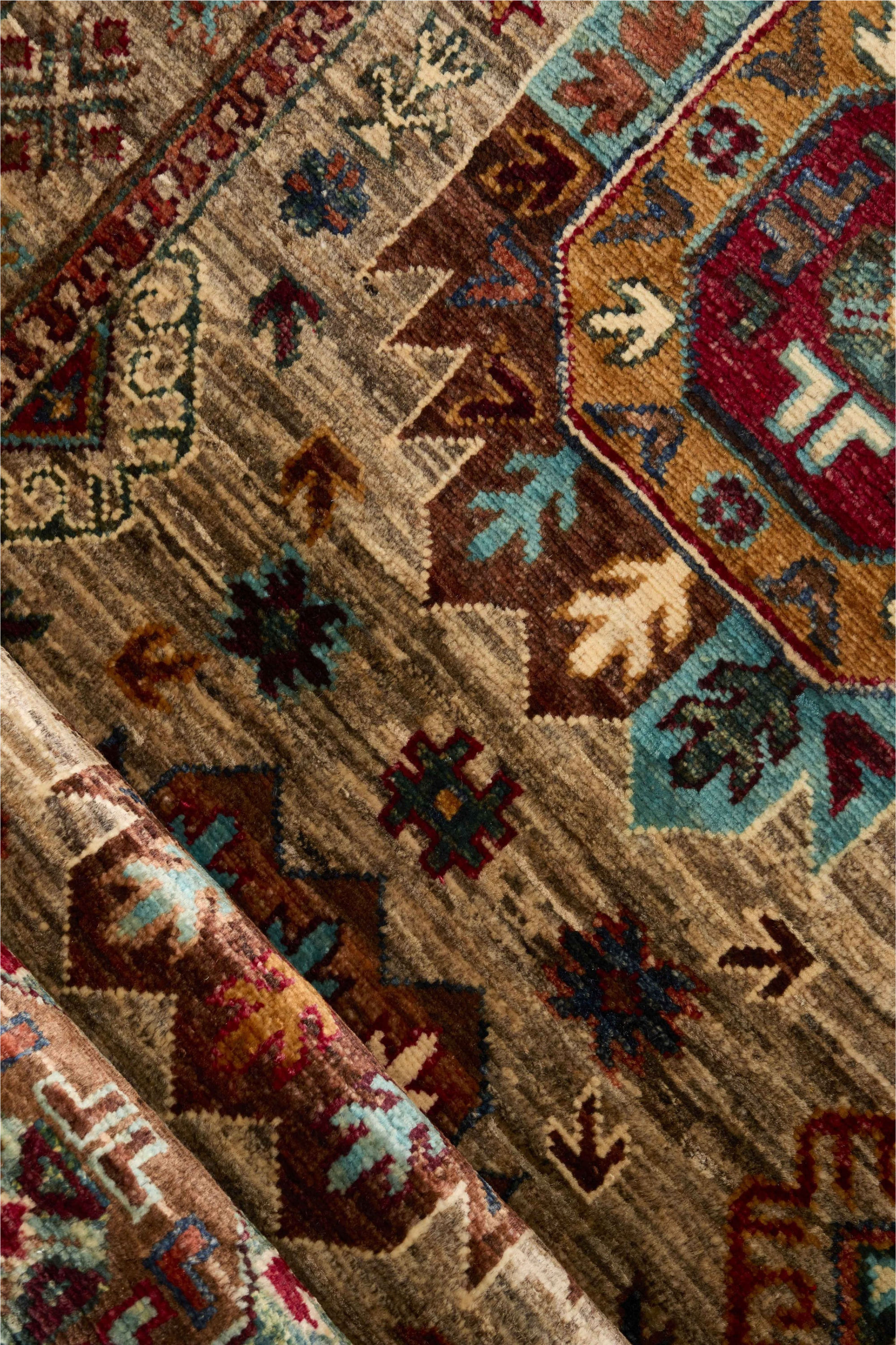 Beige oriental wool runner with a traditional bordered multicolour pattern