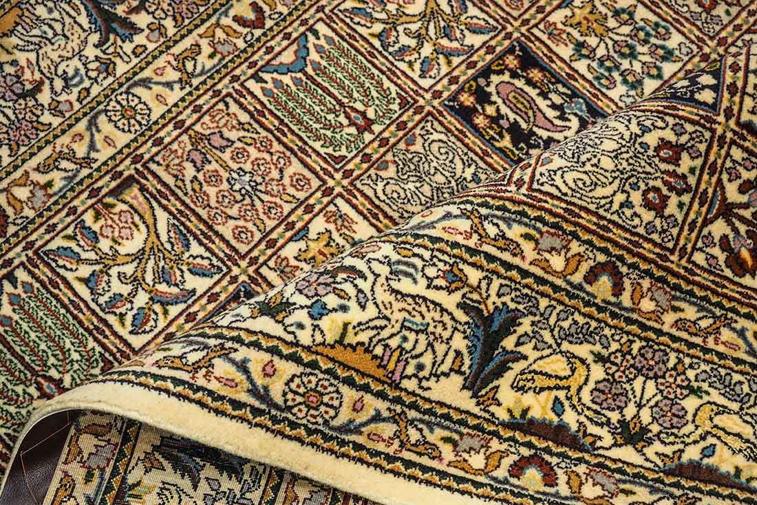 authentic persian rug with floral pattern in beige