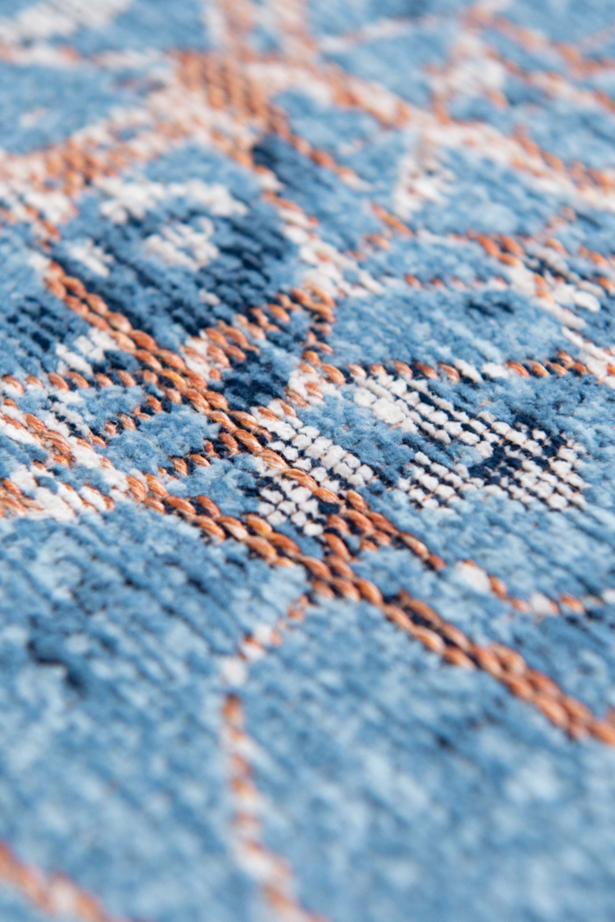 Blue abstract circle rug with a pattern inspired by the map of Tokyo