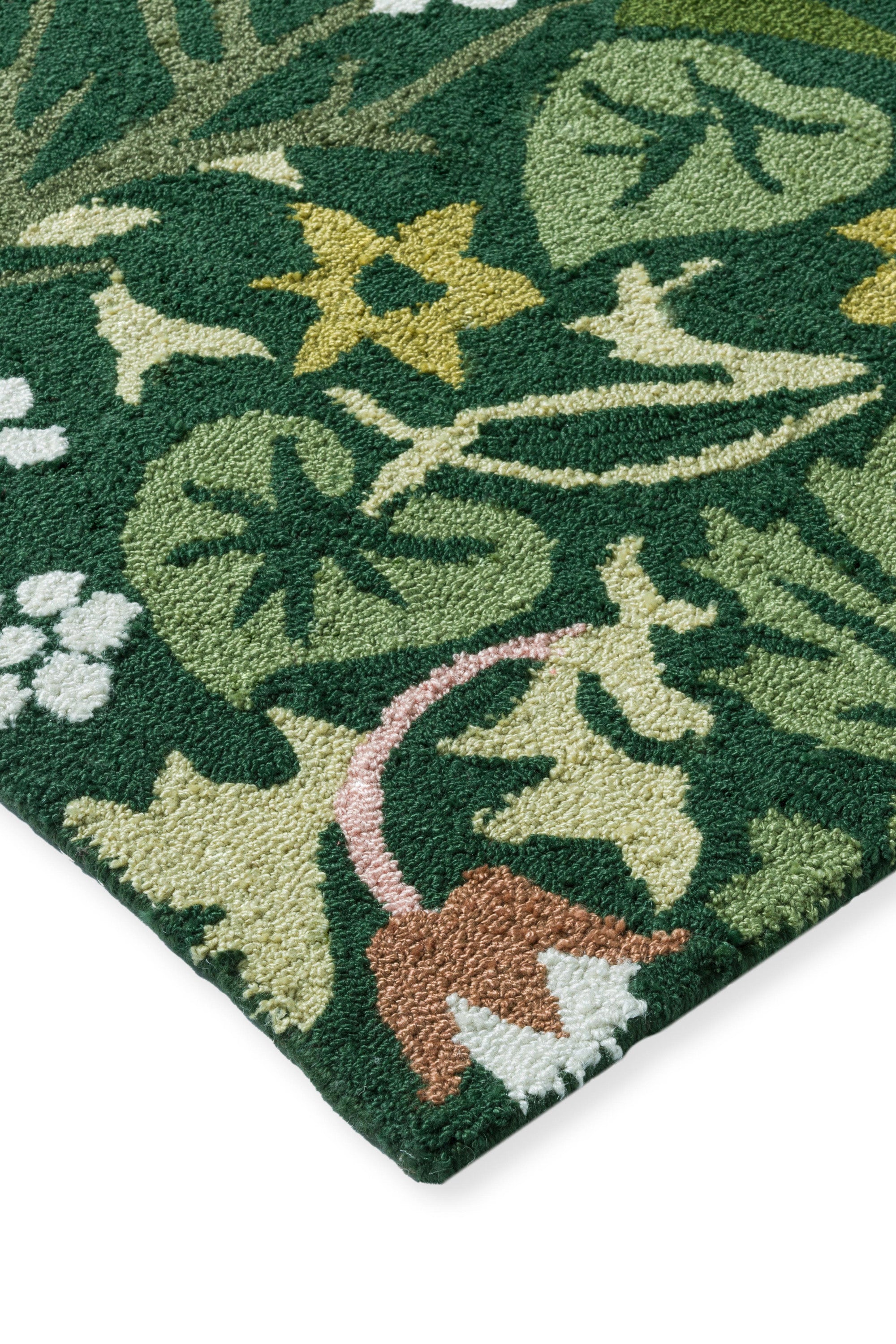 green indoor/outdoor rug with floral pattern