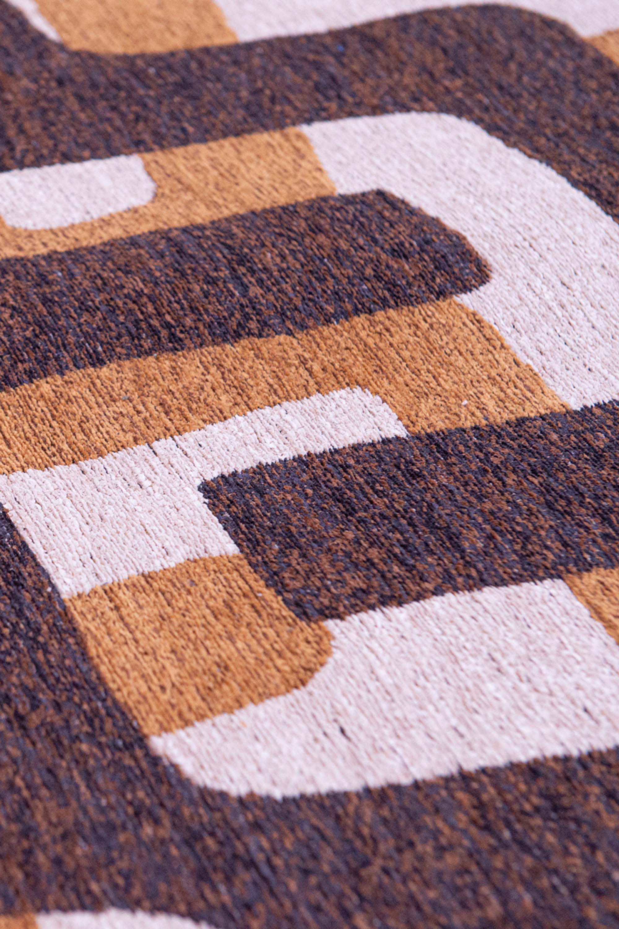 Modern abstract rug with brown maze pattern