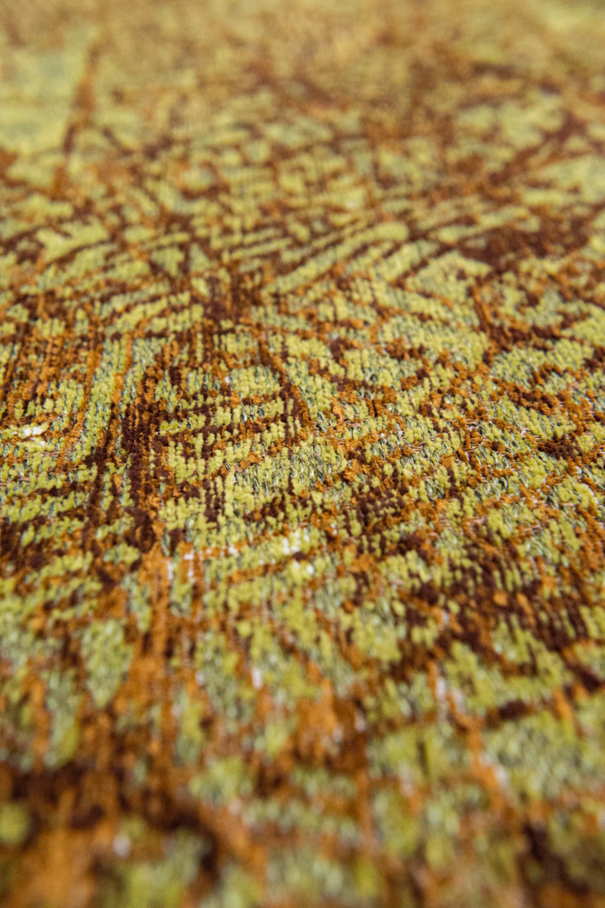 Green abstract rug with a pattern inspired by the map of London