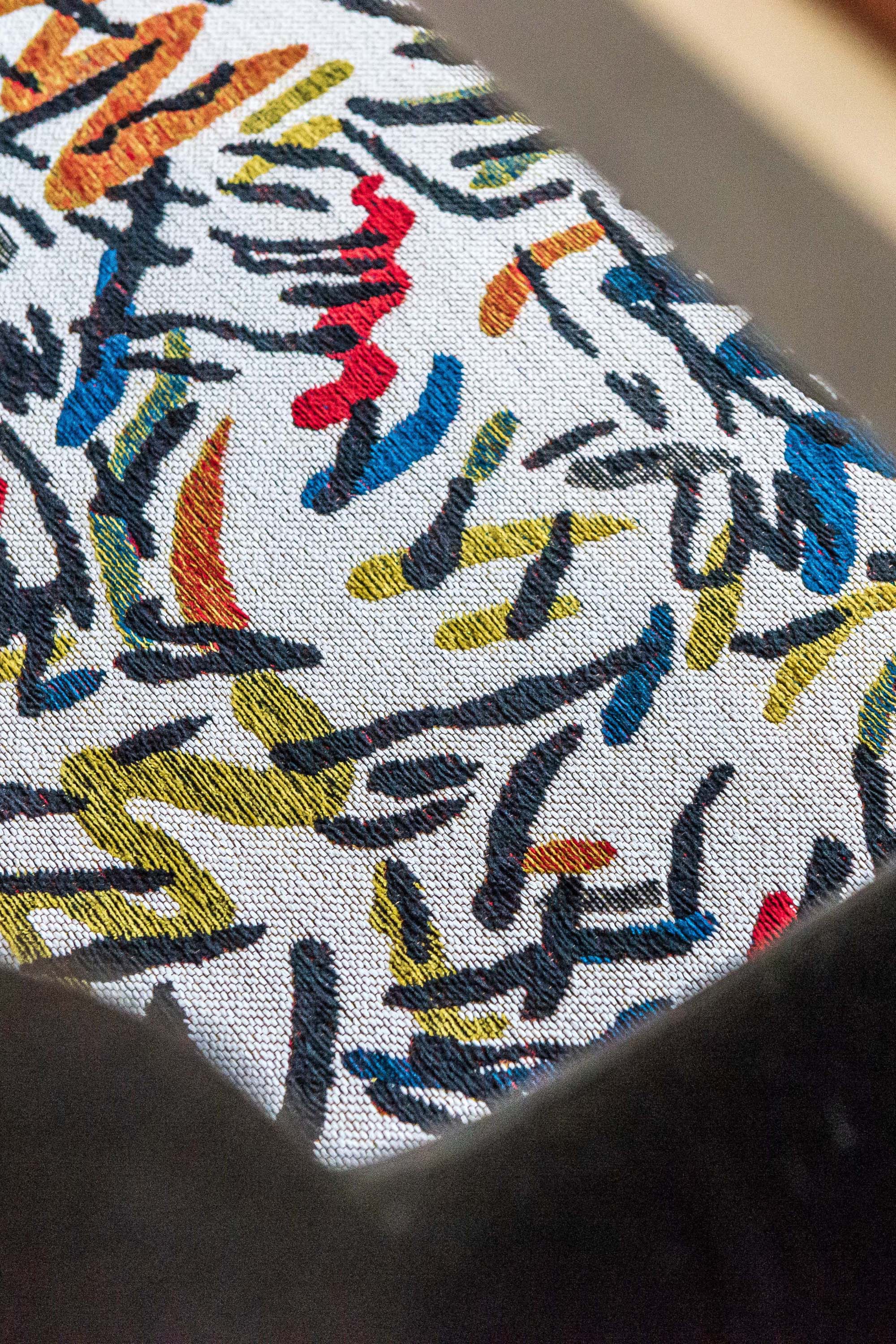 multicolour abstract rug with a squiggle design