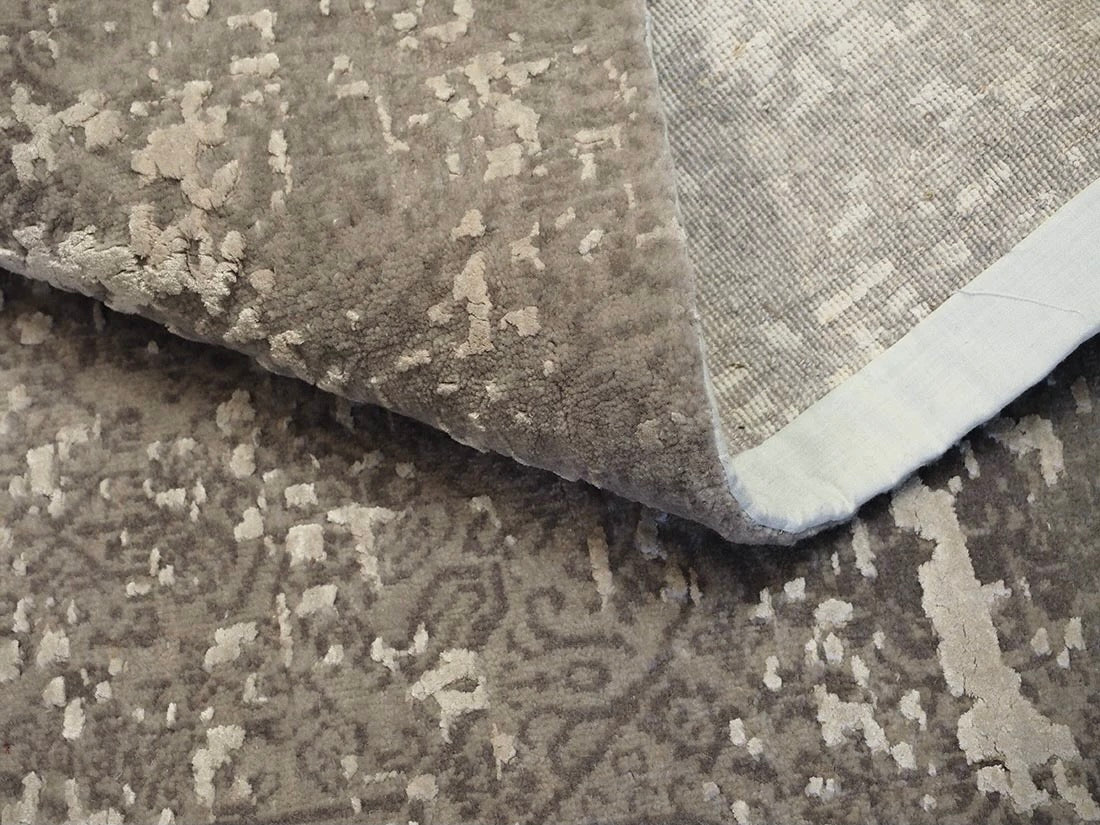 beige abstract area rug