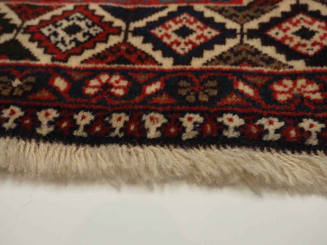 authentic multicolour persian rug with a traditional tile pattern