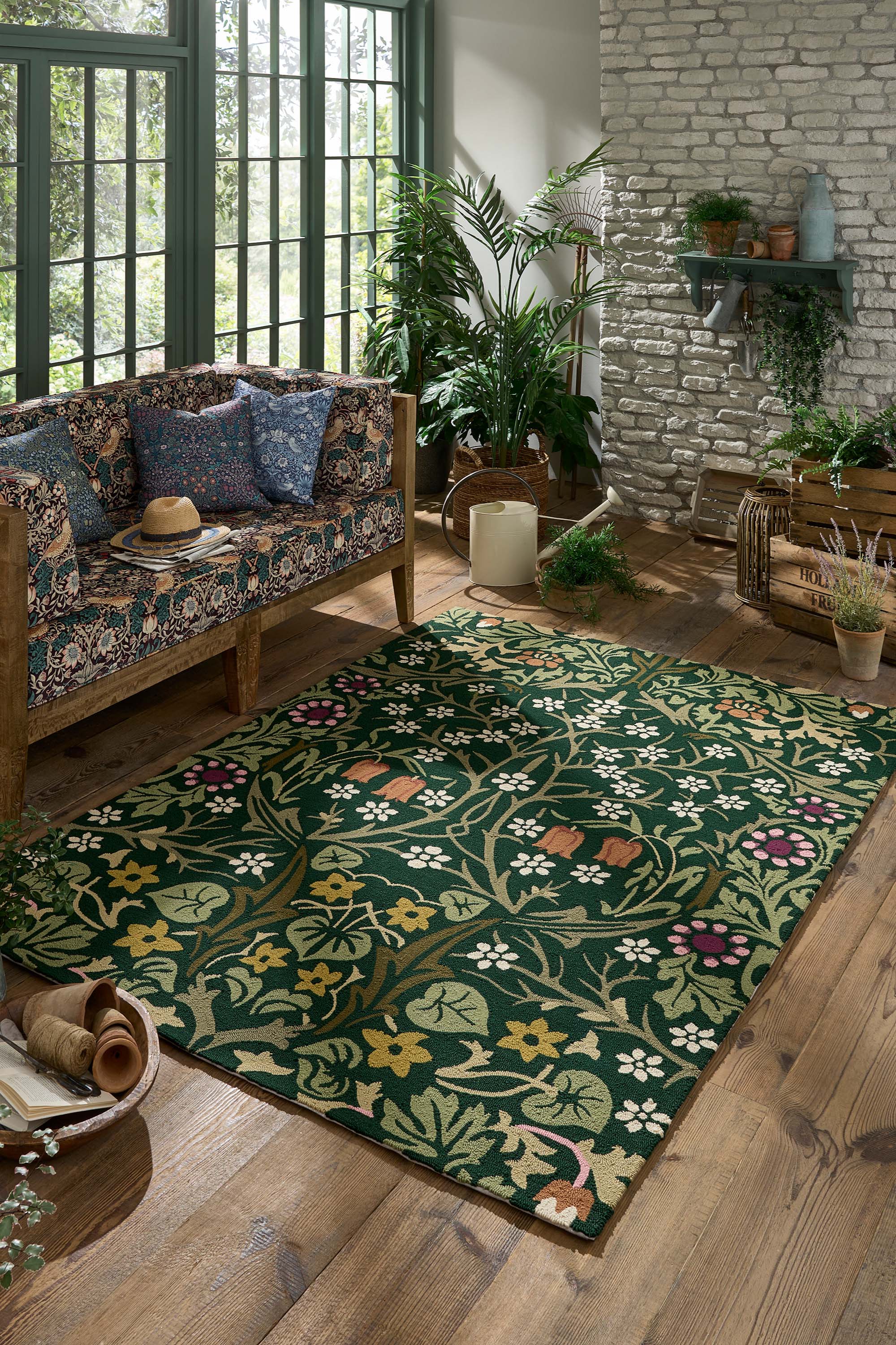 green indoor/outdoor rug with floral pattern