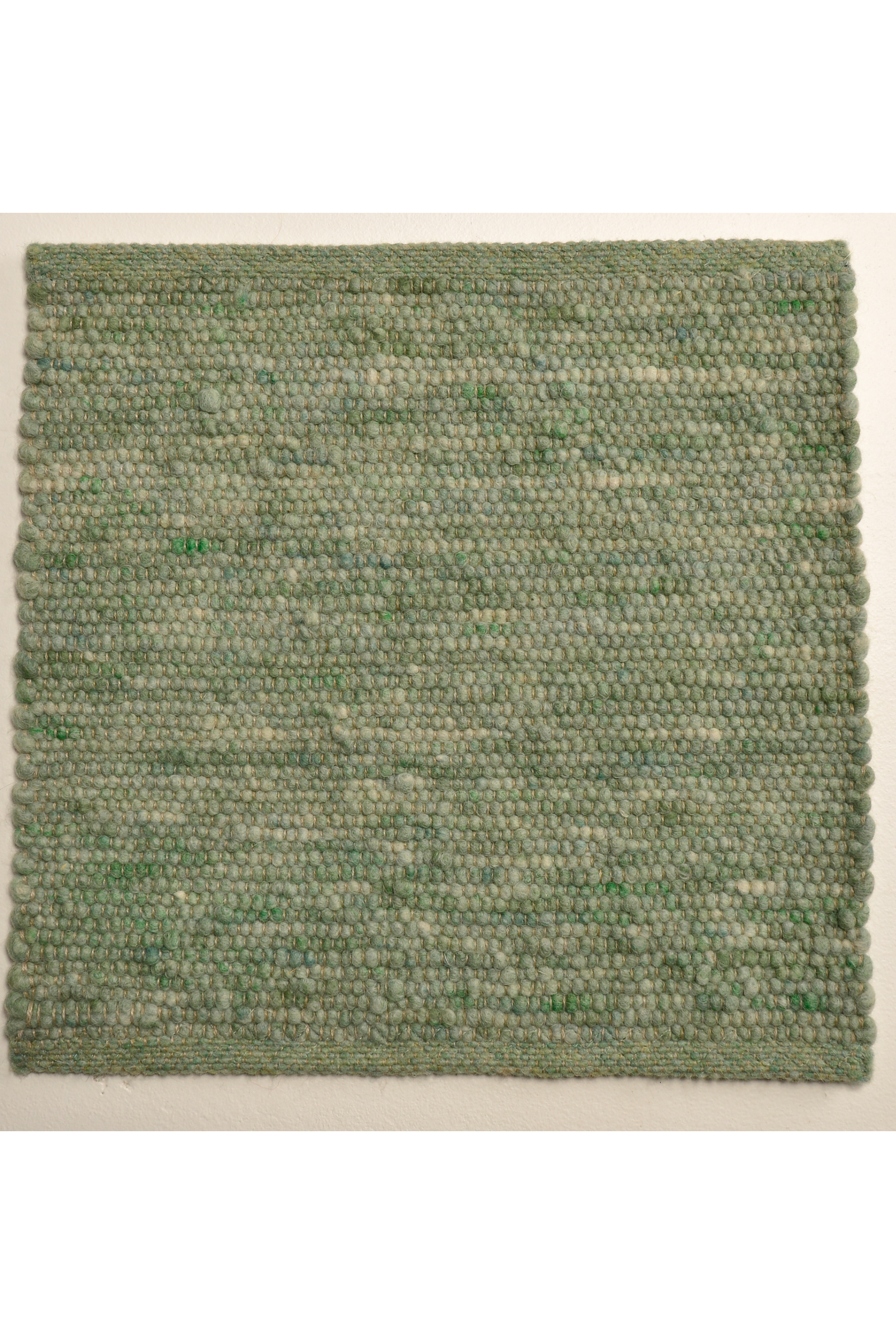 Green luxury plain handwoven rug