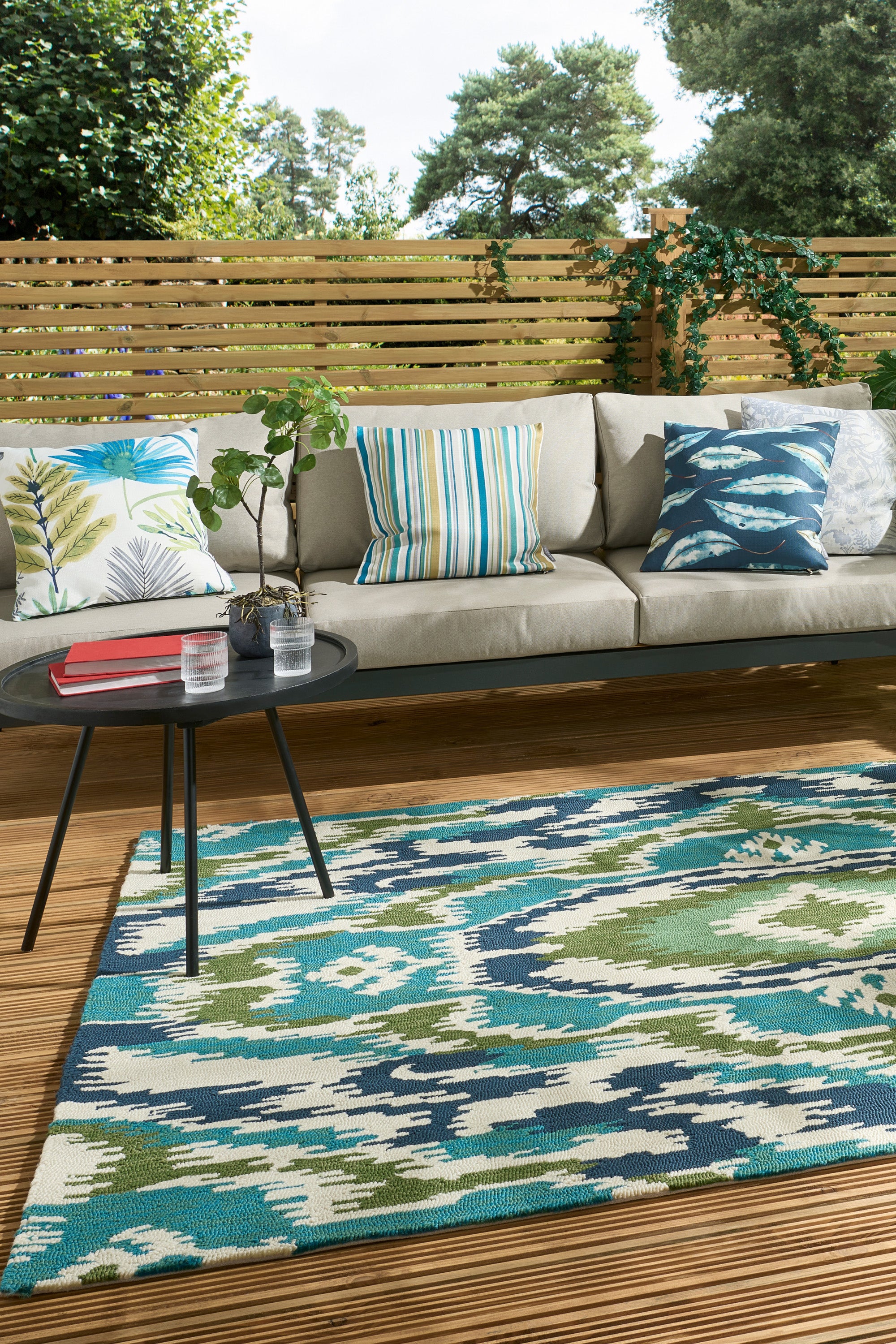 green, blue and navy abstract indoor/outdoor rug