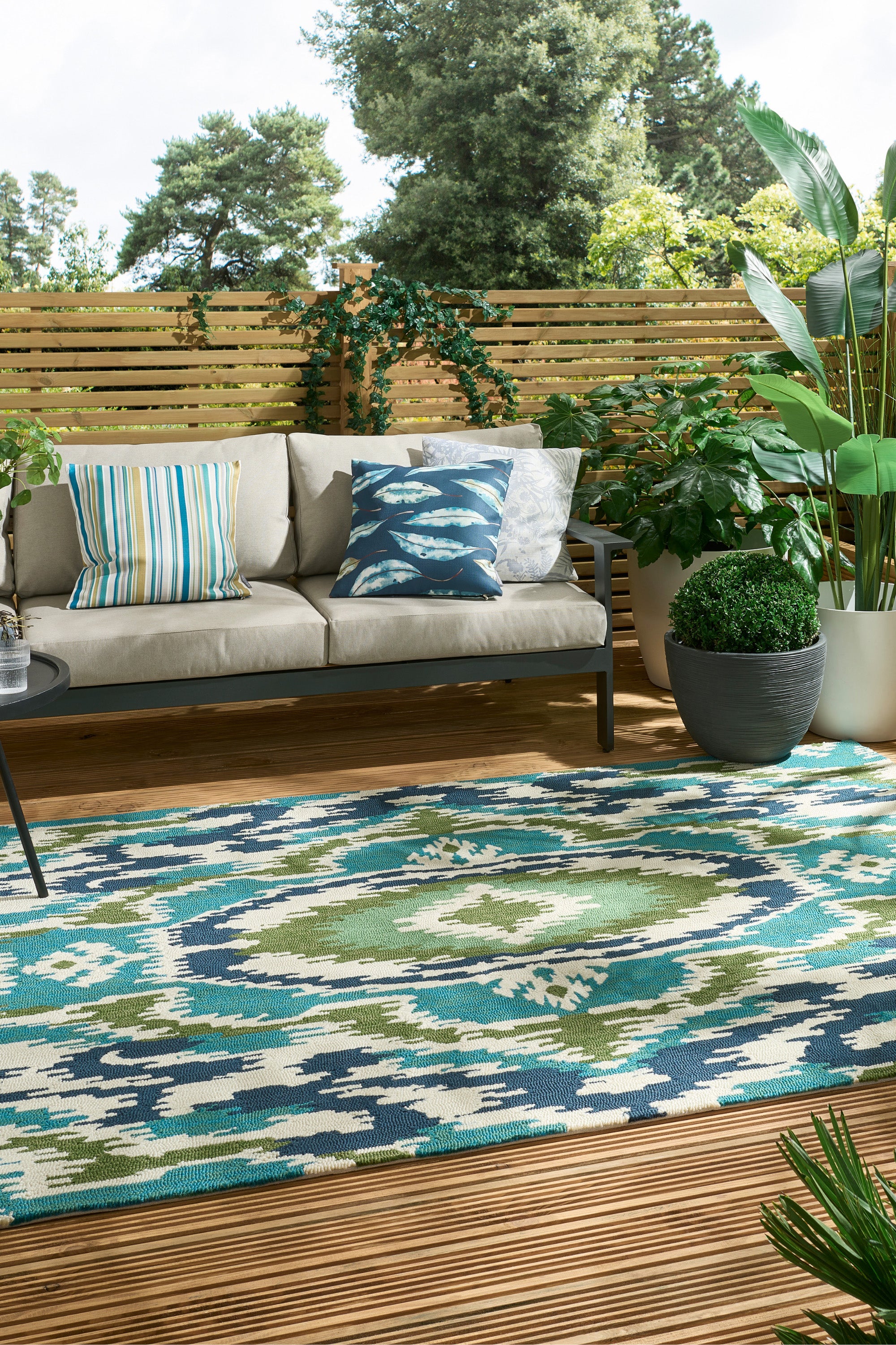 green, blue and navy abstract indoor/outdoor rug