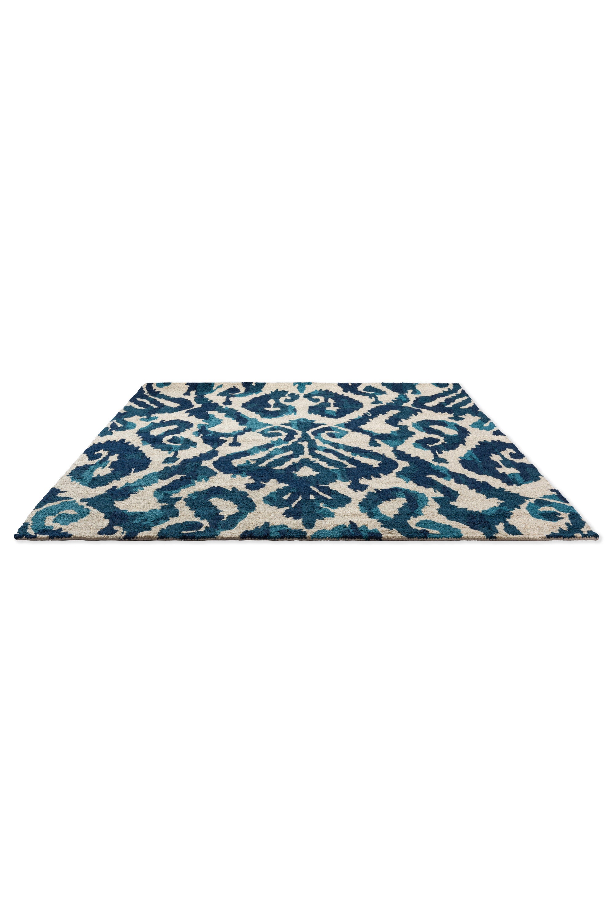 blue indoor/outdoor rug with abstract pattern