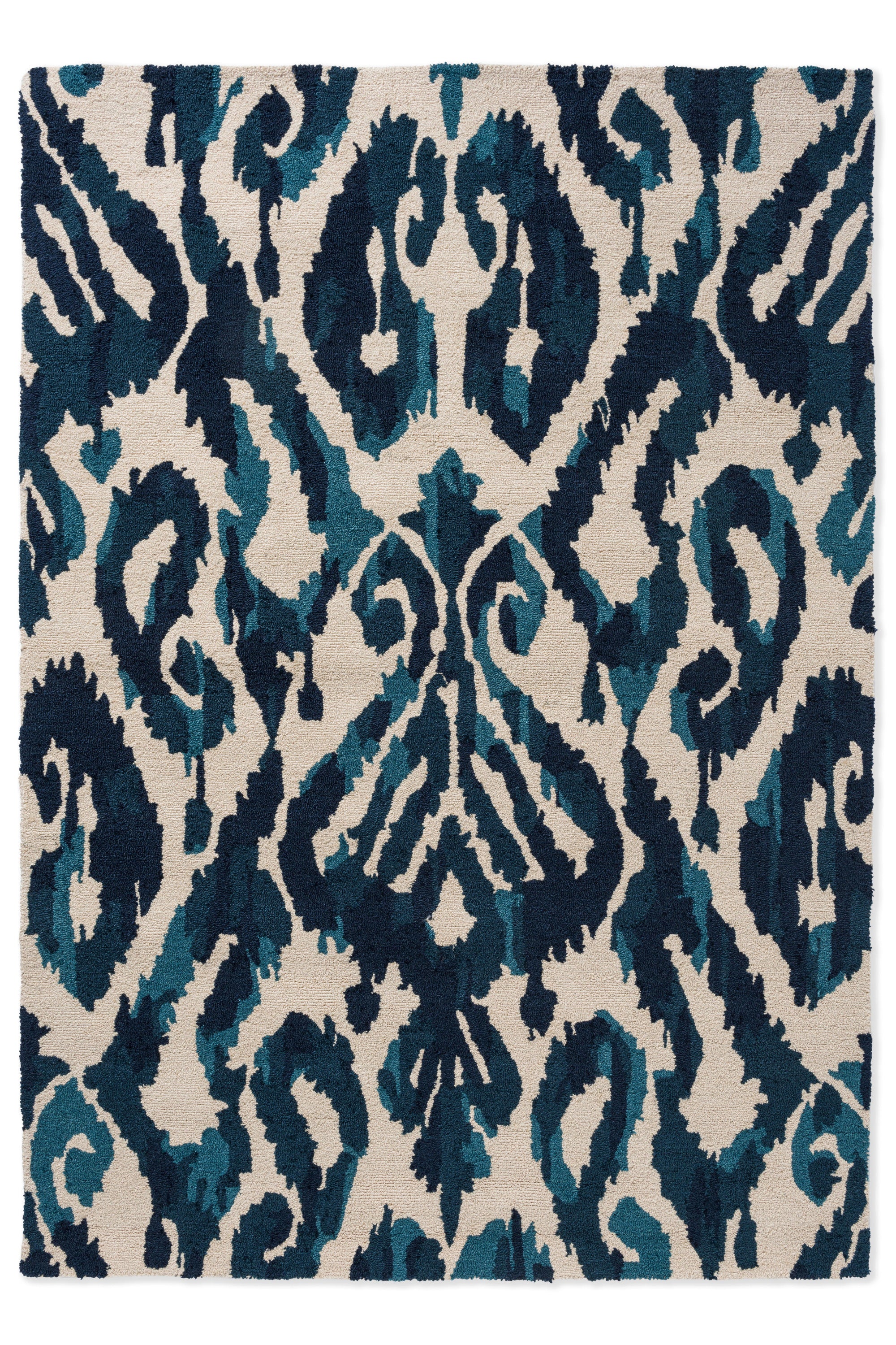 blue indoor/outdoor rug with abstract pattern