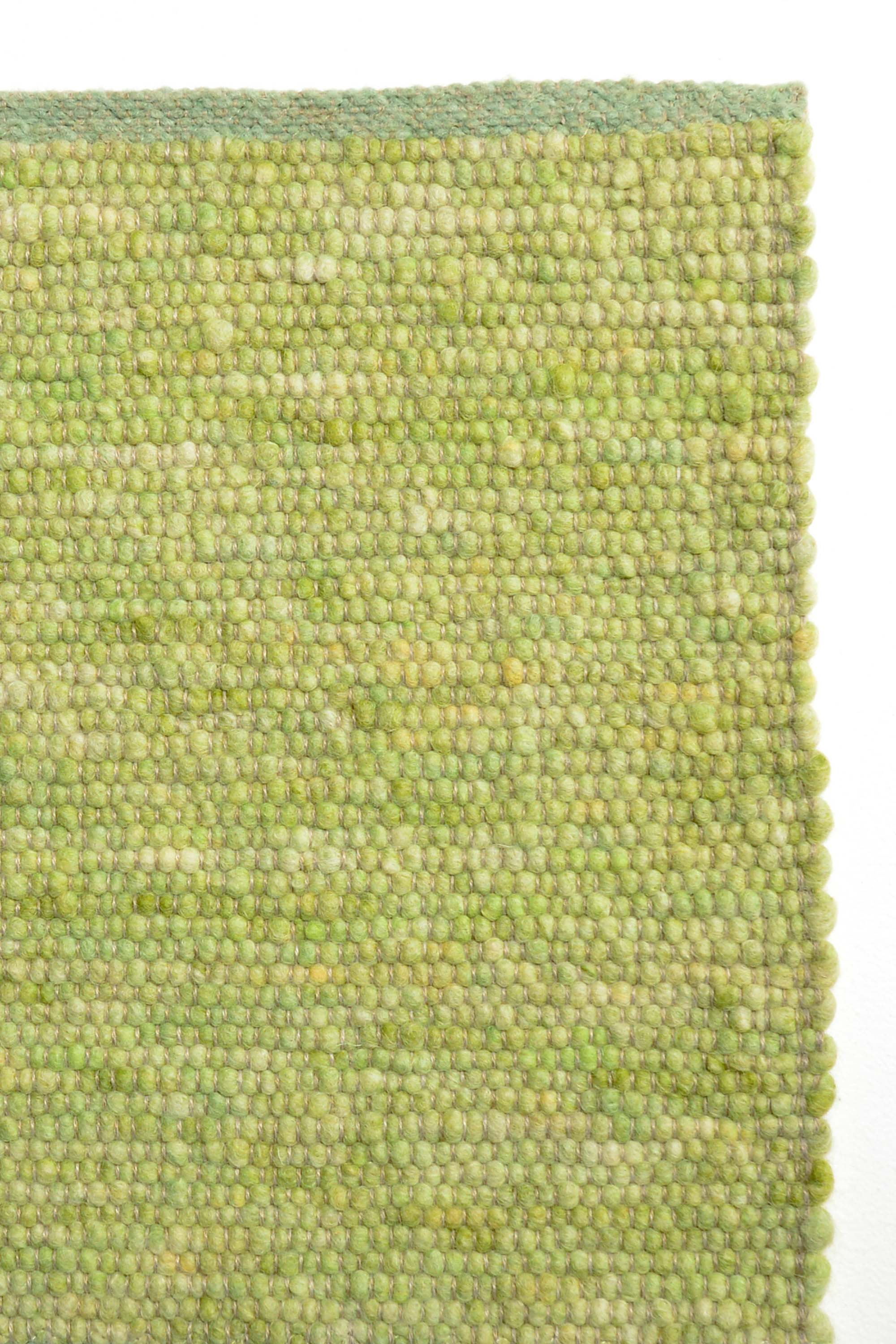 Green luxury plain handwoven rug
