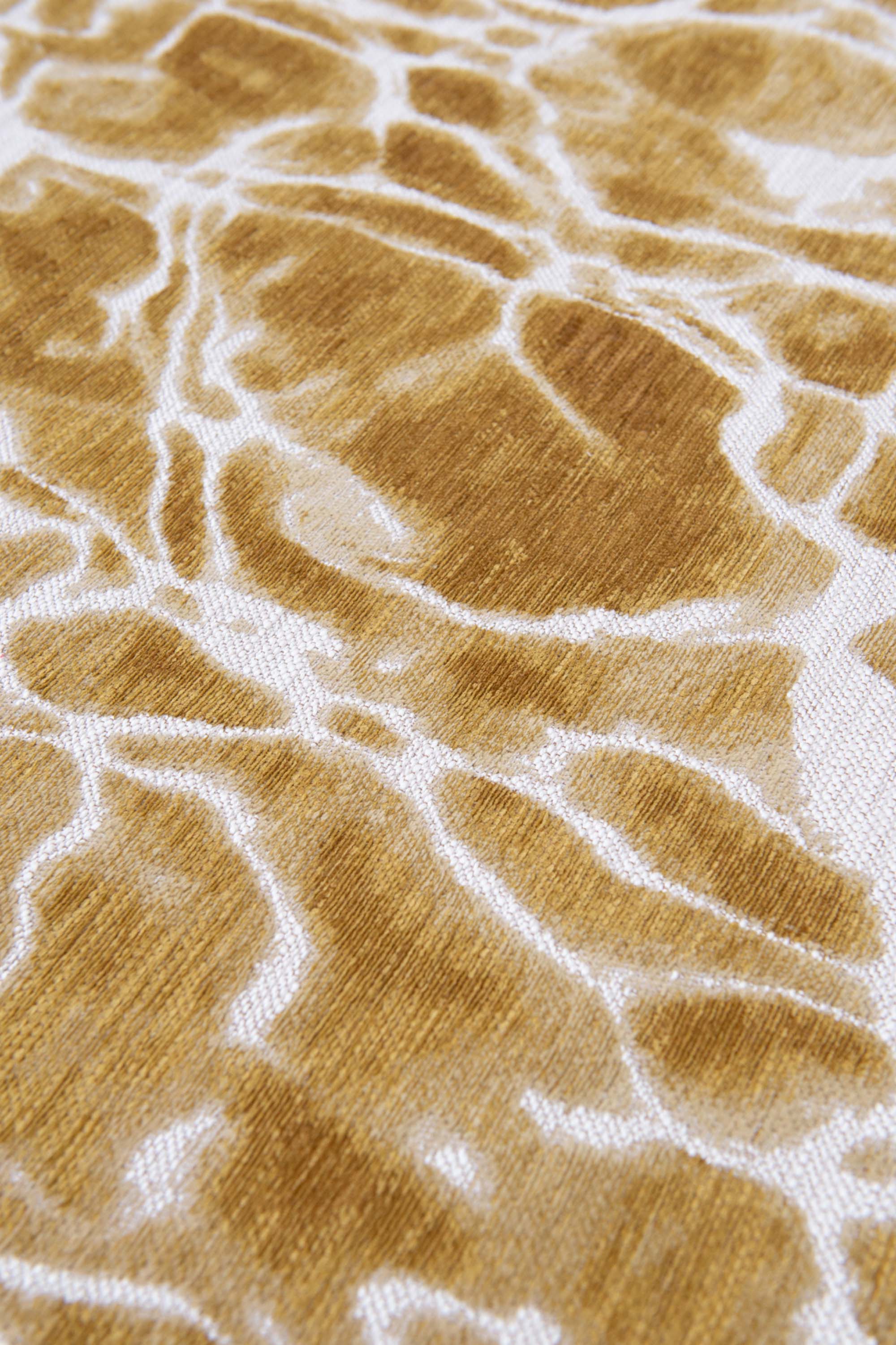 Modern runner rug with gold abstract water inspired pattern