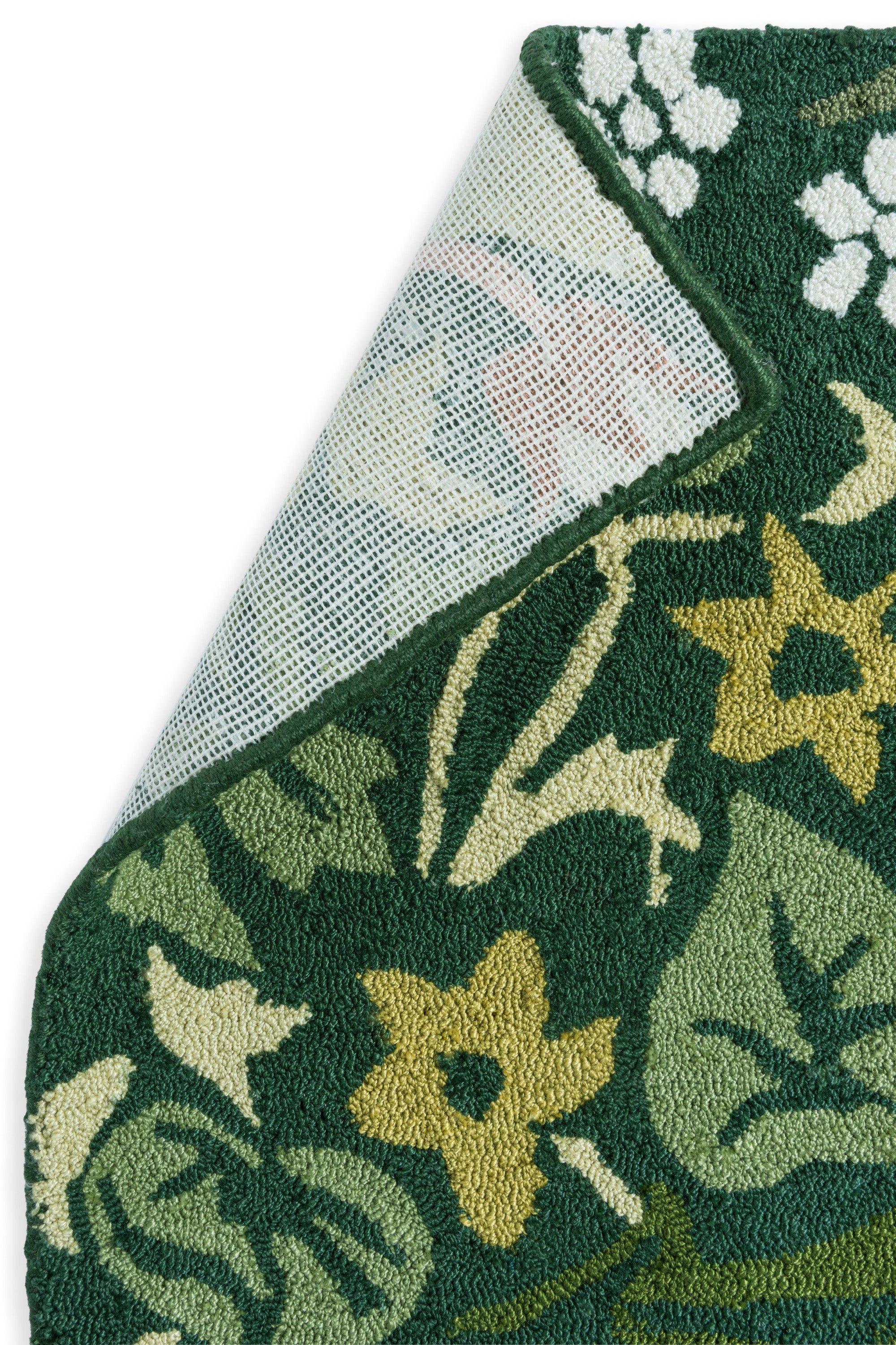 green indoor/outdoor rug with floral pattern