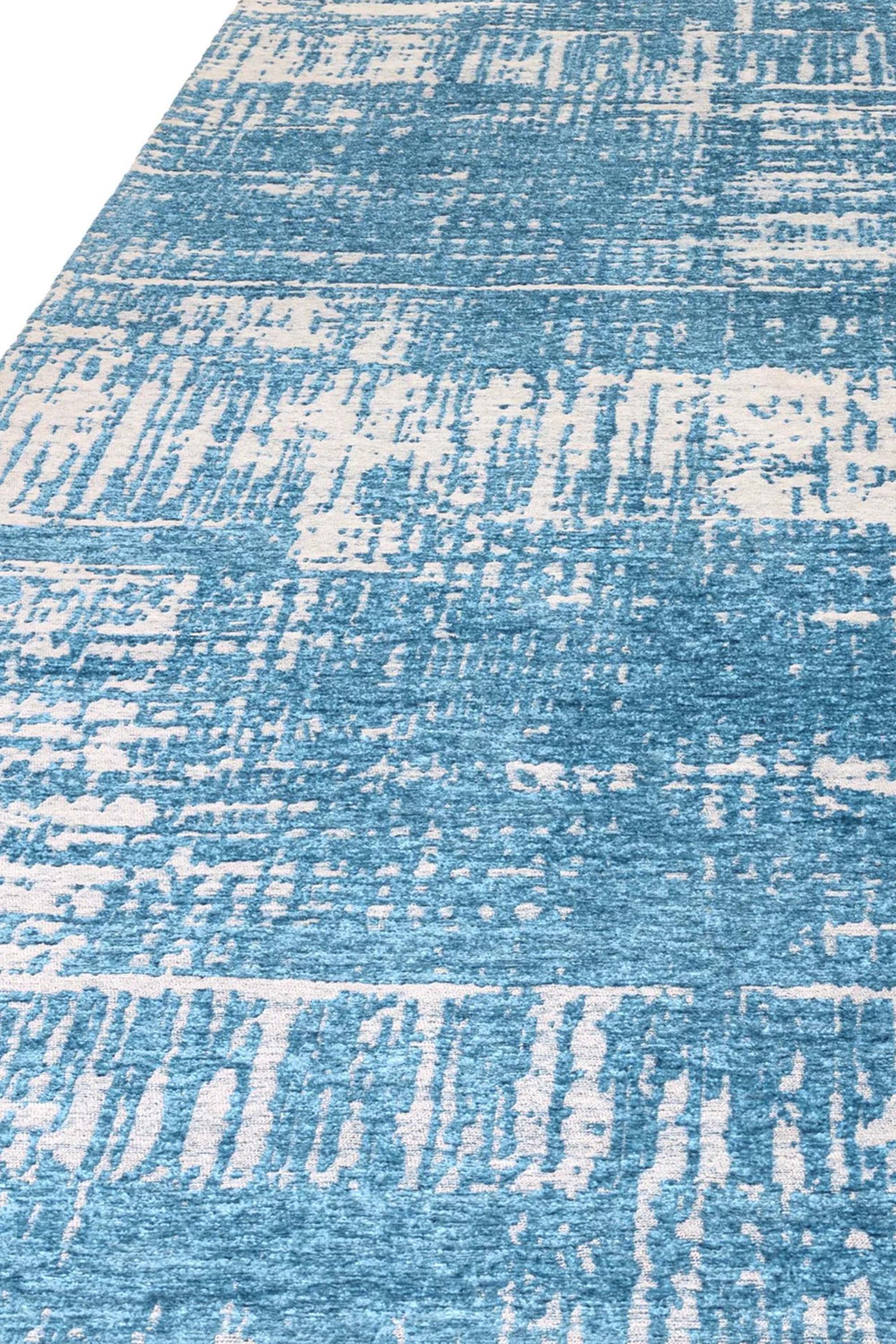 Modern blue flatweave rug with abstract pattern 