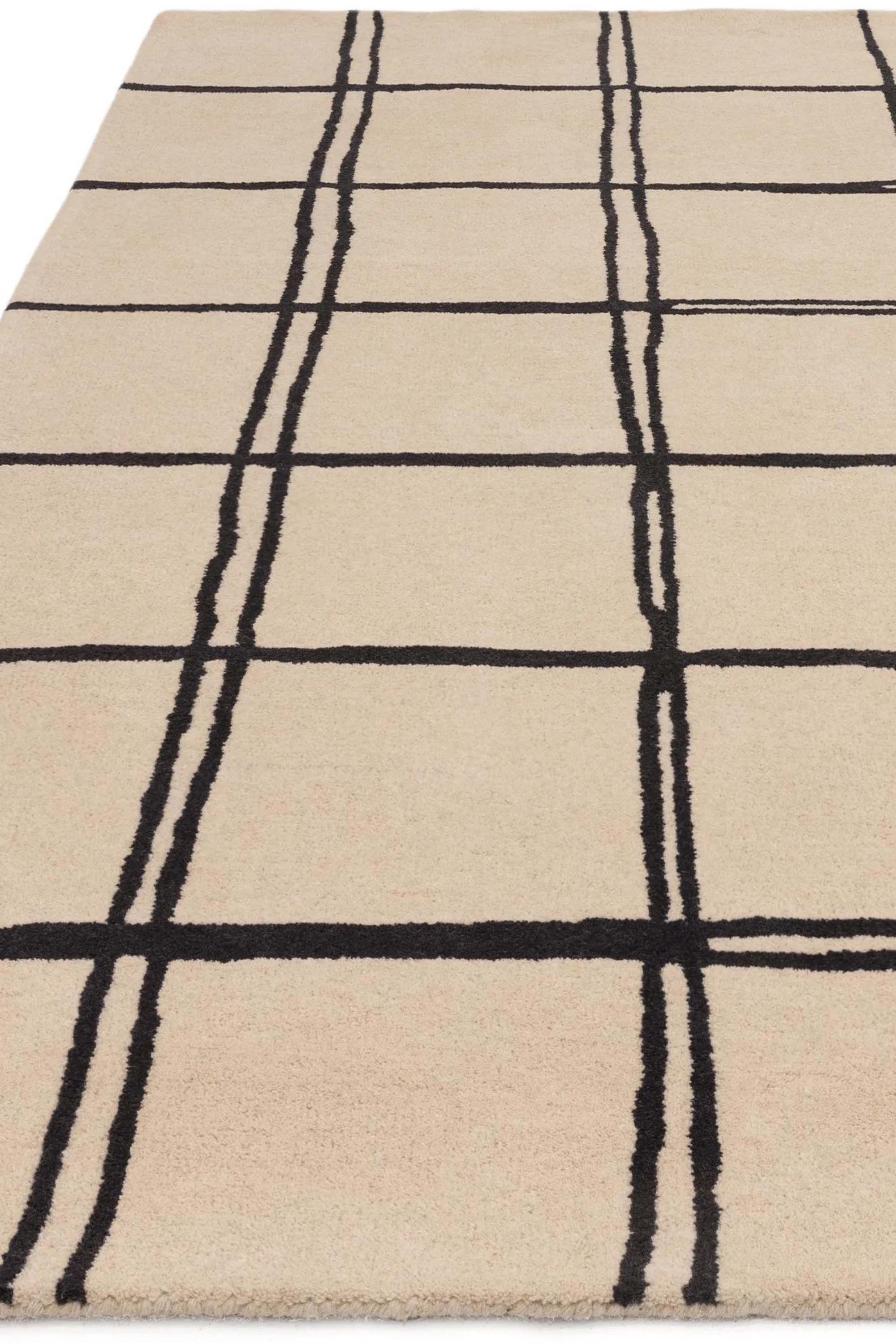 Monochrome rug with minimal geometric pattern 