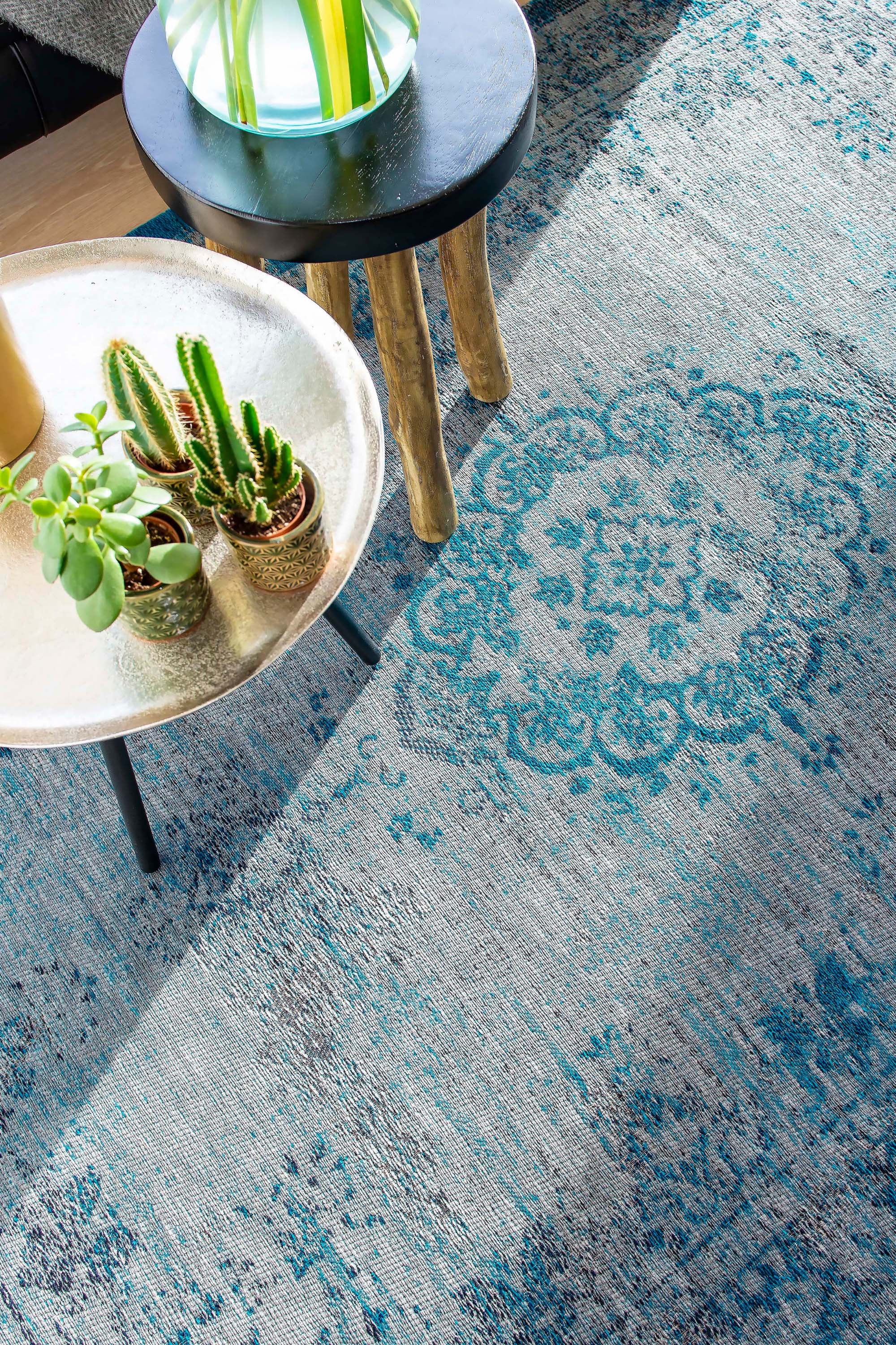 Grey and blue flatweave rug with faded persian design