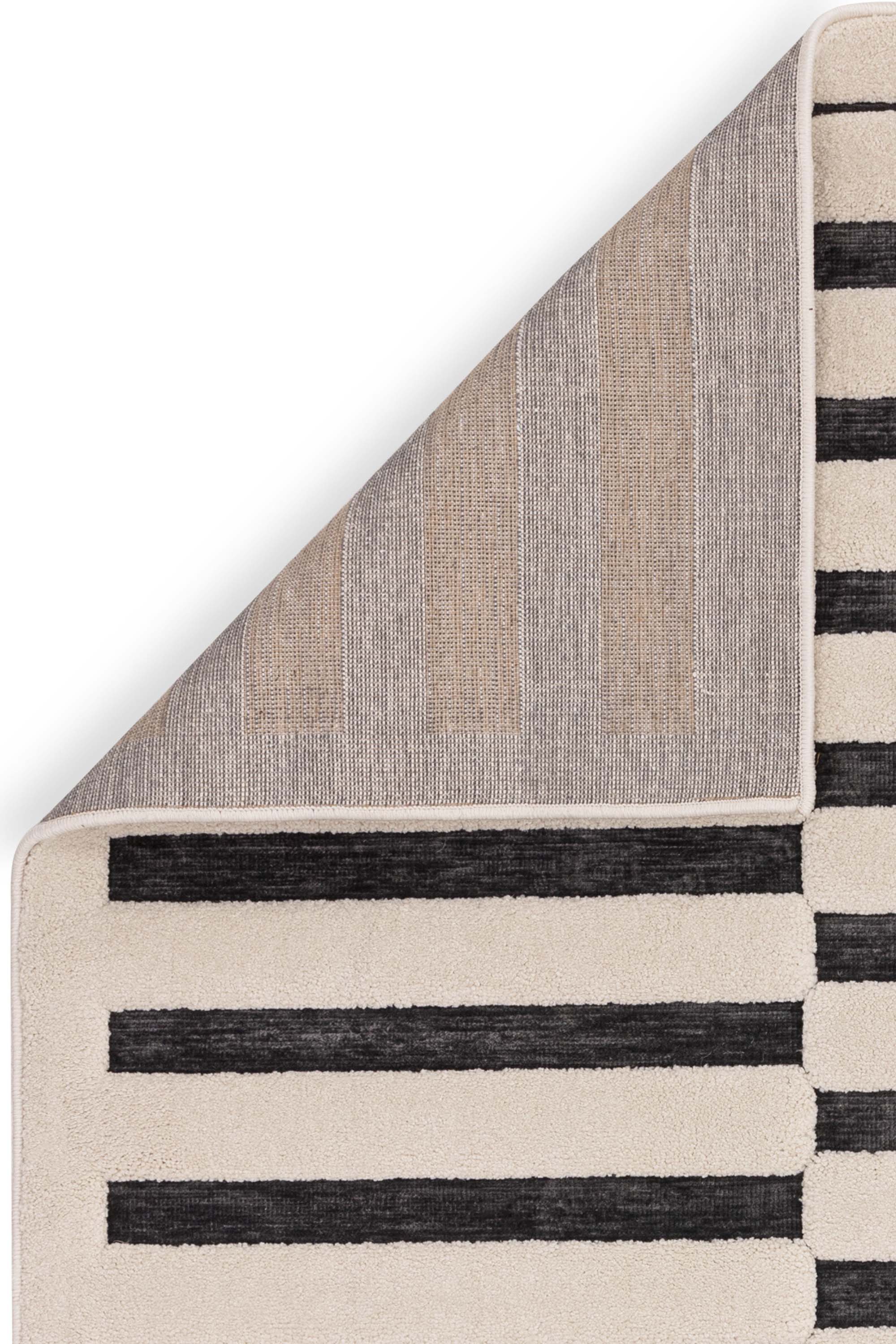 Grey and cream rug with high-low pile and minimal geometric pattern 