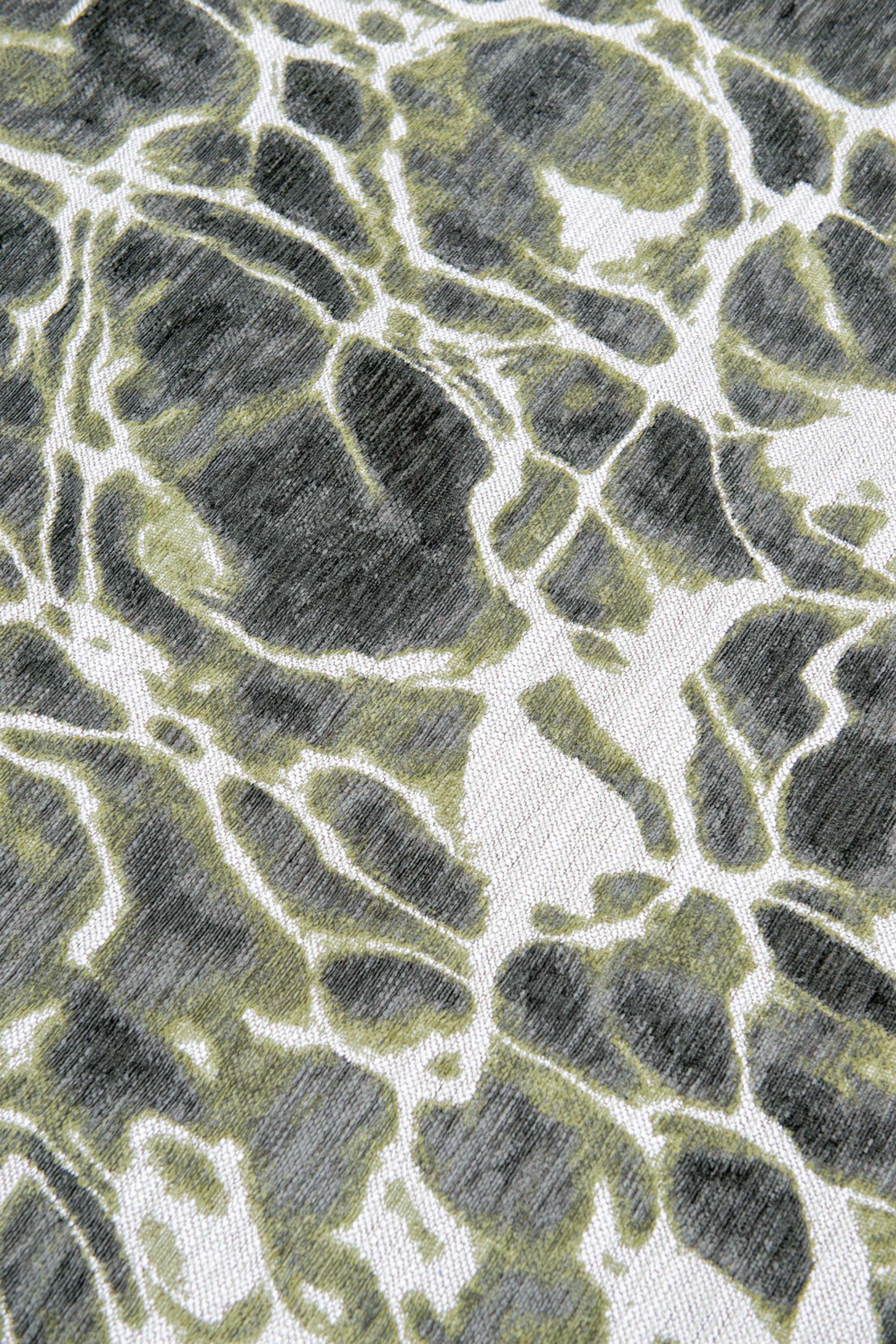 Modern runner rug with green abstract water inspired pattern